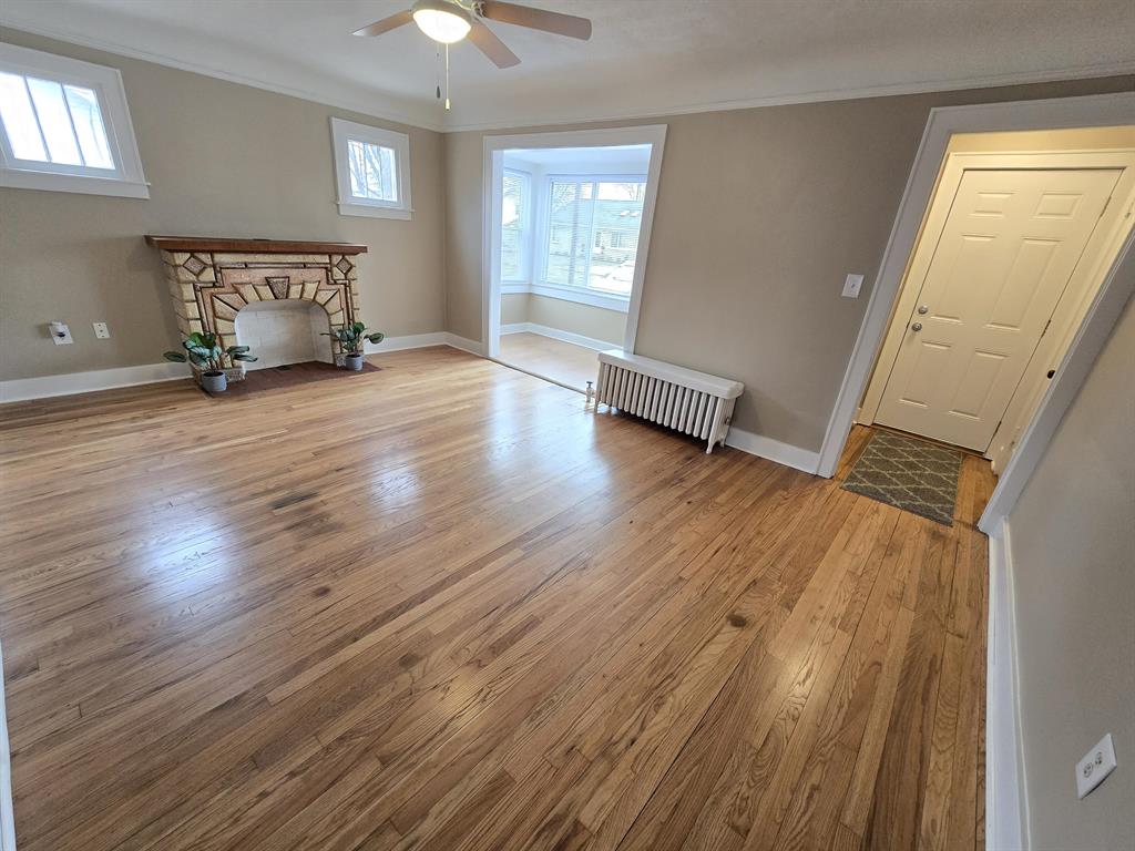 Welcome to this charming 1.5 story home in desirable Clinton Township situated on a spacious lot with a large backyard and detached 2-car garage. Inside you'll find beautiful refinished hardwood floors flowing throughout much of the home, creating a warm and inviting feel. The main level offers a bright living room with classic character, a well-maintained oak kitchen with ample cabinet space, and comfortable living areas perfect for everyday living. Large open formal dining room for all of those hosted gatherings. This home also features 3 spacious bedrooms and 1.5 baths, offering flexibility for families, guests, or a home office. The full basement provides excellent storage, laundry area, and an additional shower. Outside, the oversized yard offers plenty of room for entertaining, gardening, or future possibilities. Conveniently located near shopping, dining, parks, and major roadways, this home blends classic charm with practical space. What are you waiting for? Immediate Occupancy