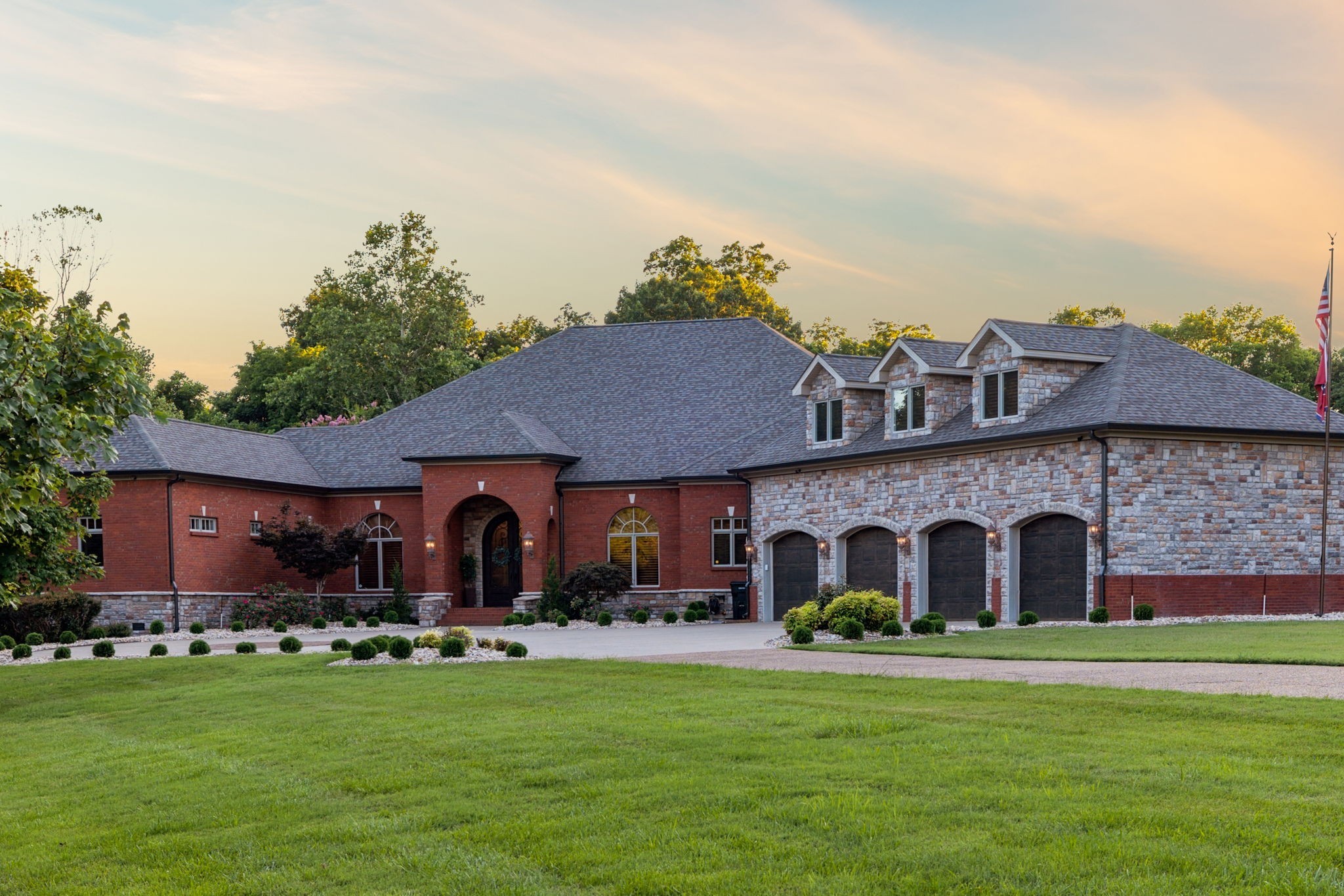 Just outside of Nashville is this Exquisite Home nestled in the Picturesque Countryside of Clarksville, Tn. Privacy is assured on this Gated Property sitting on 17+ acres with Greenbelt status. This Tranquil Paradise is a Luxurious Retreat including Magnificient Tigerwood Floors, 16-foot Coffered Ceilings in the main living area, a Chef's Kitchen complete w/ Stainless Steel appliances: Oversize Refrigerator,  6-Burner Gas Cooktop, Double Ovens plus Microwave, Compactor, Ice Maker, and Wine Fridge. Your family will relax together  in the dreamy Theatre Room located over the 4-car Heated and Cooled Garage with 2 EV Power Outlets. Your guests can stay in the Sumptuous Guest House for long or short visits. Every day you will have a front-row seat to the most spectacular sunsets viewed from your peaceful Sunset Terrace which features an enormous Stone Firepit. The 60x40 Barn can house any recreational vehicle, tools, and equipment. This home and property have been meticulously maintained.