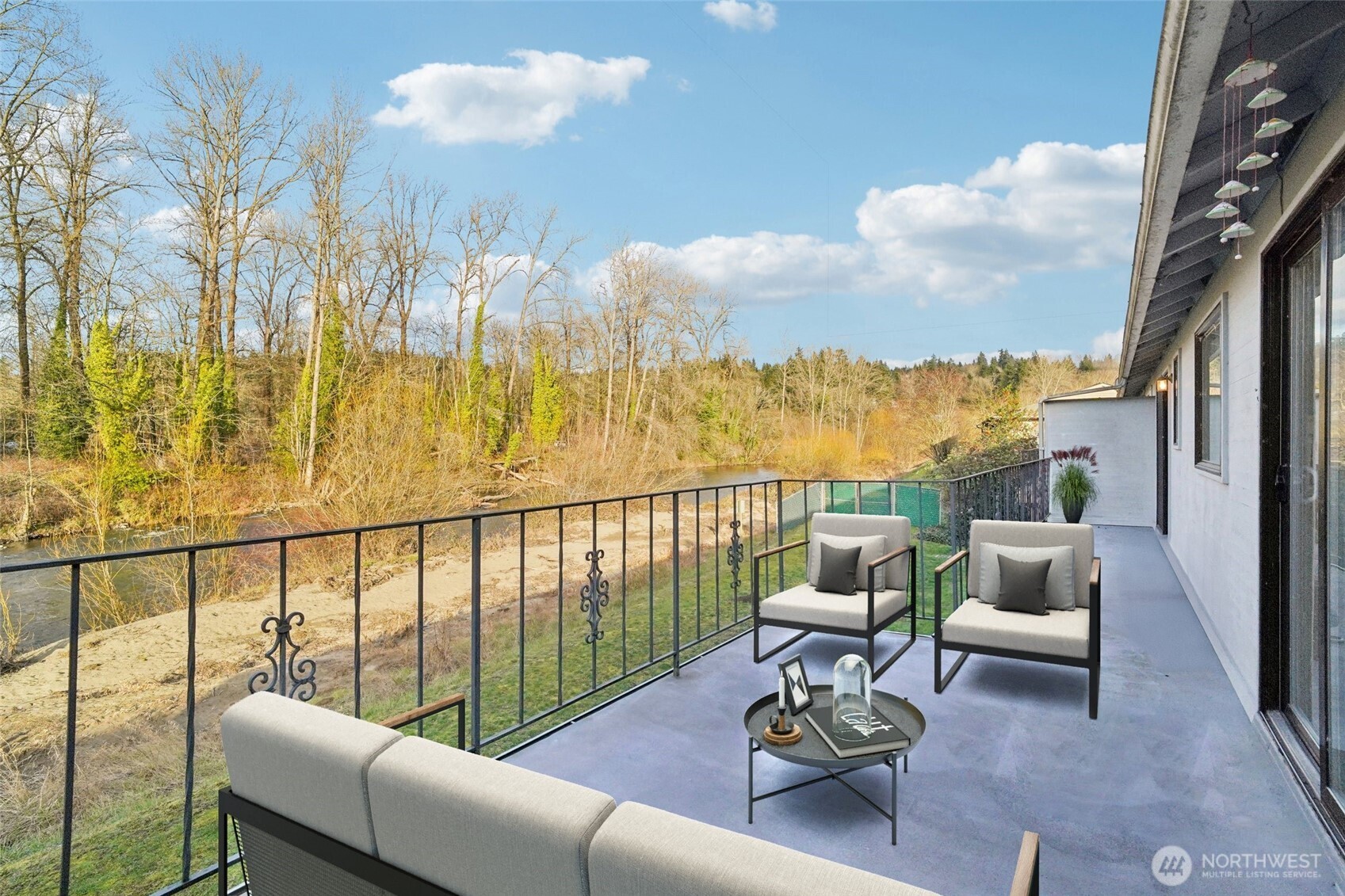 Welcome home! to this beautifully remodeled top-floor condo in Auburn. Offering 3 beds and 1.75 updated baths with modern cabinetry and tile accents. Step onto the expansive entertaining deck—accessible from both the living room and primary suite—and enjoy unobstructed, serene river and wildlife views. Inside, enjoy easy-care laminate wood plank flooring, built-in closet organizers, bookshelves, and smart living with Mysa thermostats and Alexa-controlled primary bedroom lighting. Cozy up to the wood-burning fireplace or stay cool with a newer mini-split A/C. All appliances stay! Located quietly at the back of the community, yet minutes to commutes, dining, and adjacent Dykstra Park. Amazing perks: No rental cap (stellar investment!), pet-friendly, 1-car garage with storage cabinets (+ additional reserved parking space), and community river access! Mortgage savings may be available for buyers of this listing.