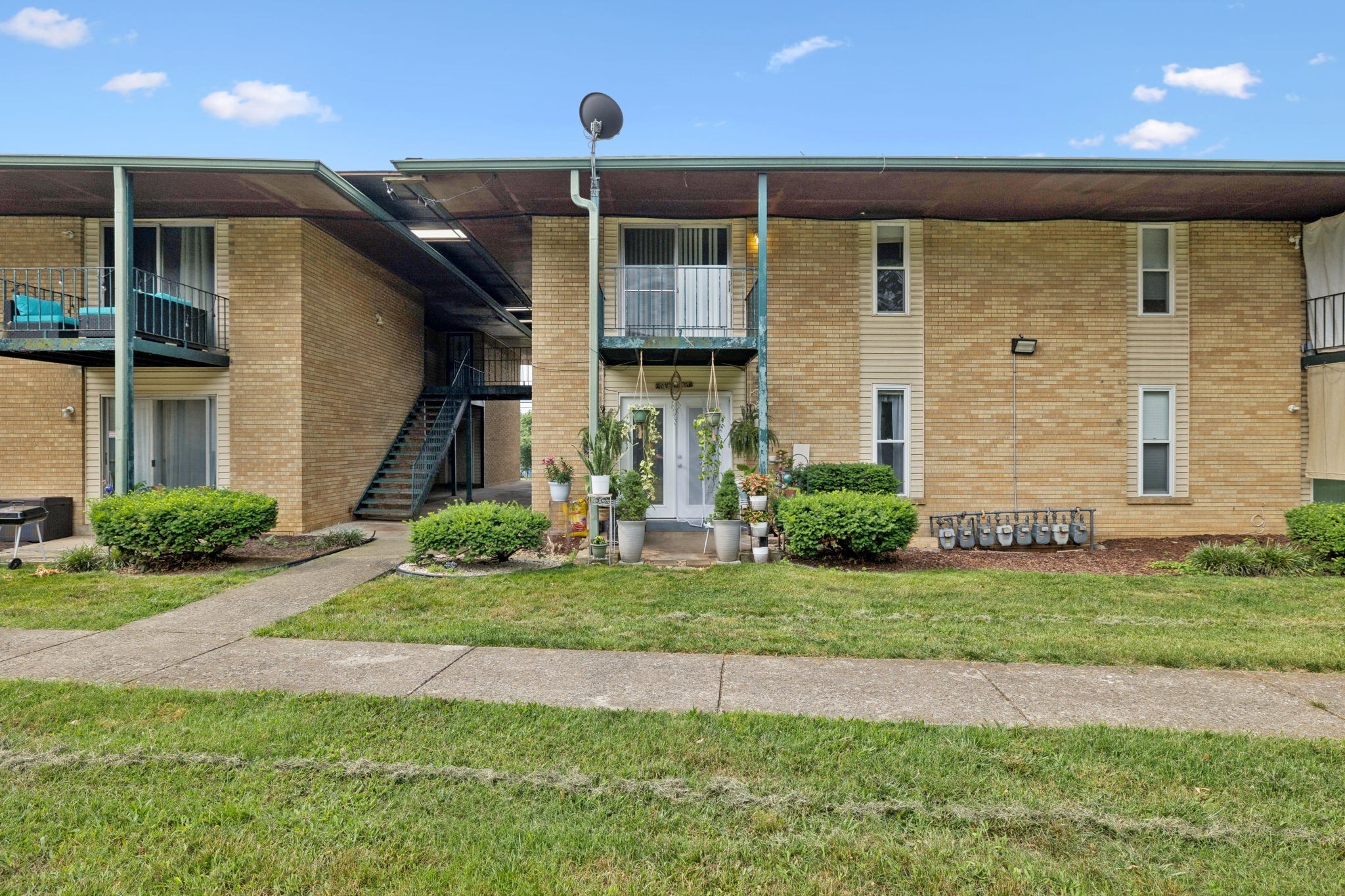 Discover comfort and convenience in this beautifully maintained 1-bedroom, 1-bath condo, perfectly situated in the heart of Madison. Located directly across from the Madison Park Community Center, this ground-floor unit offers easy access to green space, local amenities, and a true neighborhood feel. Commuters will appreciate being just minutes from I-65, Downtown Nashville, Briley Parkway, and Ellington Parkway, while everyday essentials like grocery stores, restaurants, and Opry Mills Mall are all nearby. Inside, enjoy a cozy, thoughtfully designed living space, complete with a walkout covered patio. Washer and dryer are included—move in and make it yours!