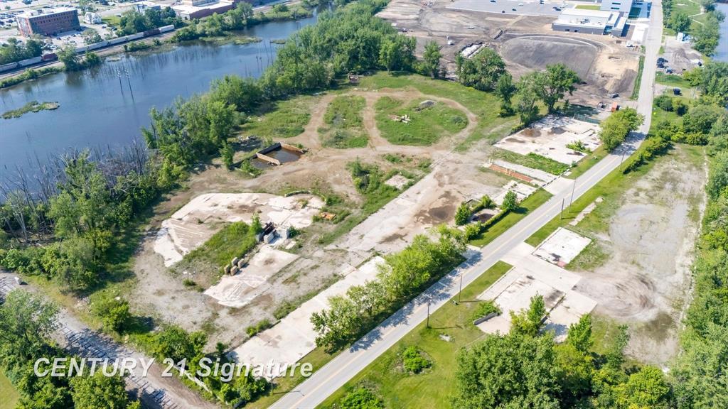 Unlock the potential of over 31 acres, 4 acres of riverfront mixed use land, perfectly suited for redevelopment. This exceptional opportunity includes a total of 12 parcels, offering endless possibilities for growth and investment