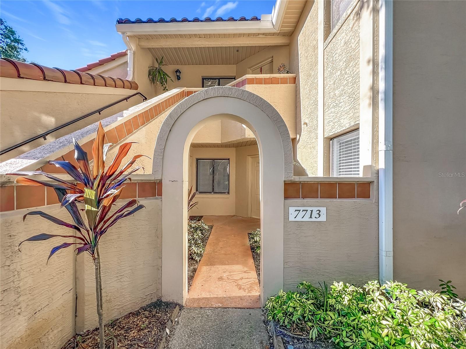 Come check this beautifully tote; renovated condo at the first floor unit in the heart of the gated Dr. Phillips community, Sanctuary at Bay Hill. The split, Three bedroom/two bath floor plan has new luxury vinyl plank flooring/baseboards, fresh neutral colored paint, brand new kitchen with brand new appliance  water heater is 2021 and ac is 2021  Each spacious bathroom has its own beautifully designed tile work. . Enjoy your screened-in back balcony hat has a peaceful, nature view. And, even though this is a condo- it has a one car garage with lots of storage. Sanctuary At Bay Hill Condominium is a well-planned and secure community offering a swimming pool, playground, tennis court, basketball court, and fitness center. Strategically located just minutes from Universal and International Drive, next to the best restaurants, entertainment, hospitals, top rated schools and so much more!