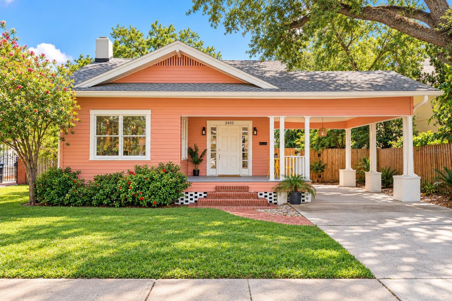 SOUTH TAMPA CHARM, A STUNNING SALTWATER POOL & SPA, AND AN UNBEATABLE LOCATION! Nestled in the highly sought-after New Suburb Beautiful neighborhood, this charming 3-bedroom, 2-bath bungalow with an office is filled with natural light, timeless character, and architectural details that make it truly special. From the welcoming front porch to the original hardwood floors and beautiful crown molding, every room radiates warmth and charm. A formal sitting room featuring a cozy wood-burning fireplace creates an inviting space to gather, while French doors lead into a beautiful office featuring stunning stained glass. The spacious dining area flows into a bright kitchen featuring a charming breakfast nook, double ovens, and generous pantry storage, while a separate family room features French doors opening directly to the backyard. The primary suite offers hardwood floors, dual closets, and convenient access to the pool area through the primary bathroom. STEP OUTSIDE TO YOUR OWN TROPICAL PARADISE! A stunning saltwater pool and spa gracefully curve alongside the home, creating a truly unique outdoor retreat. Expansive pavers stretch throughout the backyard, offering incredible space for entertaining, outdoor dining, lounging in the sunshine, or relaxing under the stars. Lush tropical landscaping, a fully fenced yard, and a detached storage shed complete this private oasis. AND THE LOCATION IS JUST AS IMPRESSIVE! Just a short stroll to iconic Bayshore Boulevard and steps from the heart of SoHo, you can walk to the end of your street and find some of Tampa's most celebrated restaurants, including the legendary Bern's Steak House, along with incredible dining, coffee shops, and nightlife. Hyde Park Village, Downtown Tampa, and the Riverwalk are all just minutes away. Original charm, abundant natural light, an unforgettable backyard, and one of Tampa's most desirable walkable neighborhoods. This is South Tampa living at its finest!