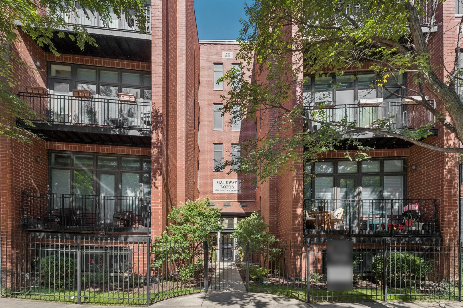 Welcome to this Expansive 2BR 2BA with Open Floorplan and a Huge Fabulous Private Deck (Refinished 2022)! Exceptional Newer Building in One of the Area's Most Desirable Locations of Roscoe Village / Lakeview. Gleaming Hardwood Floors, High Ceilings, Exposed Brick and Fresh Paint (Sept 2025) Welcome You to this Rear Main Floor Unit. Updated Open Kitchen Features Island with Bar Seating, 42" Cabinetry, Quartz Counters, Subway Tile Backsplash and Stainless Steel Appliances. Adjacent Spacious Eating Area Offers Plenty of Room for Entertaining. Enjoy the Welcoming Respite of the Living Area Featuring a Brick Fireplace,  Wall of Windows with Custom Remote Blinds and Views to the Spacious Deck! Bedrooms Feature Continued Hardwood Floors, Canned Lighting and Plentiful Closet Space. Both Baths are Well Appointed with Cabinetry, Tub/Showers. Murphy Bed and In-Unit 2024 Washer & Dryer are Features You Will Appreciate! Furnace 2022 Hot Water Heater 2022 and AC 2020 are Updates to Assure Piece of Mind. Convenient Elevator Building Also Features Storage Room, Rec Room w/ Ping Pong, Exercise Room and Shared Rooftop Deck! Garage Parking Caps off Your List of Must Haves to Make this the Perfect New Home For You! Convenient to Brown Line, Blue Line, bus routes and a Myriad of Shopping and Restaurants. Ideally situated in highly sought after vibrant Roscoe Village community with extensive array of charming boutiques & cafes, fests and fairs. Enjoy nearby green spaces offering parks, playgrounds, picnic areas, sports fields, pool and pet-friendly areas.  City Life At Its Best! COME SEE SAT 9/20 AND SUN 9/21 1-3PM.