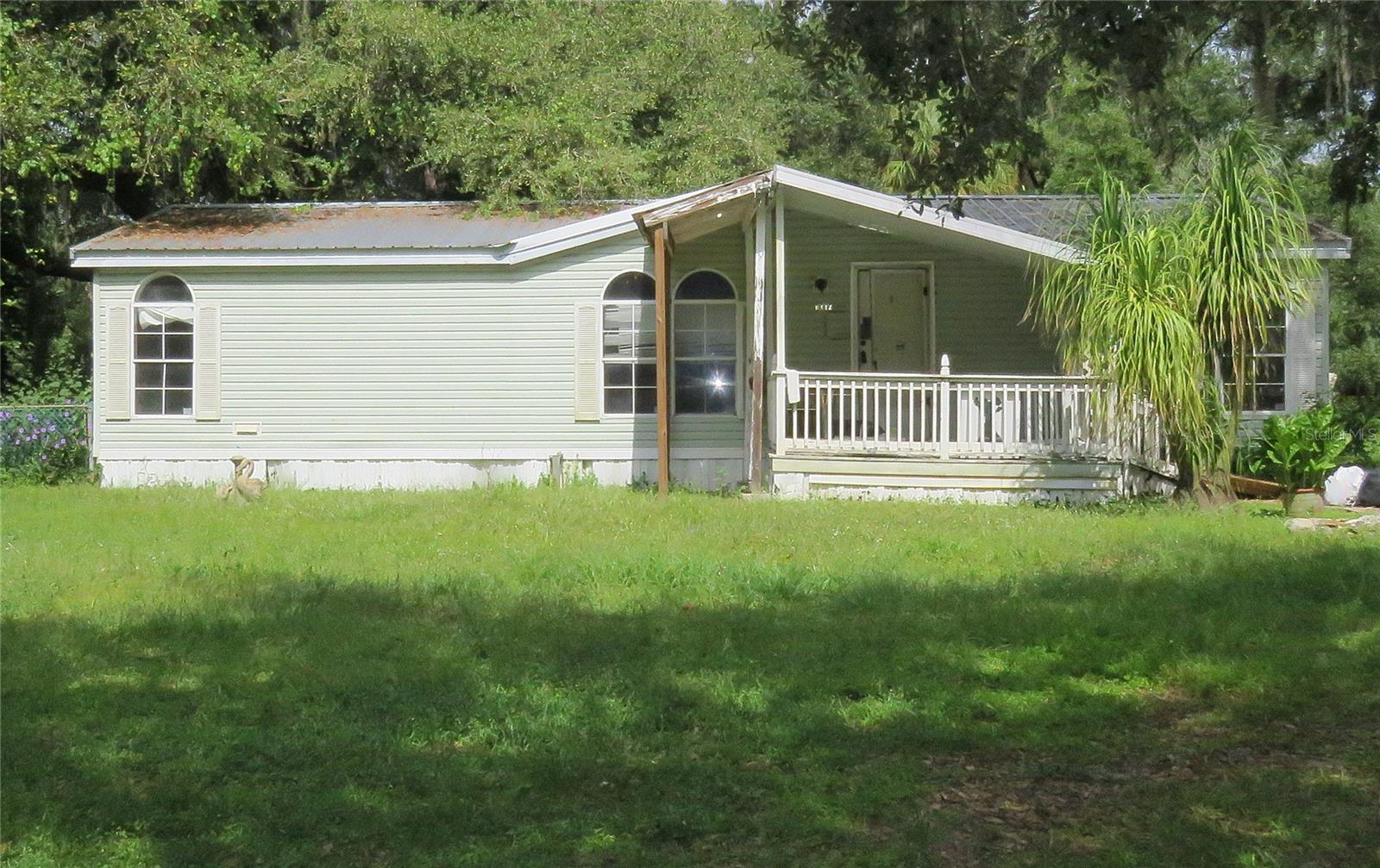 Under contract-accepting backup offers. Spacious 3-bedroom, 2-bathroom mobile home on a 0.9-acre lot in Plant City, perfect for investors or handy buyers looking for a project! This property offers over 1,200sqft of living space and features a carport, covered porches, and multiple sheds for storage or hobbies. The lot is nearly an acre in size, offering privacy and ample space for gardening, recreation, or pets. Home and land need significant cleaning, repairs, and updates throughout—an ideal fixer-upper opportunity for those wanting to build sweat equity. The property is located in an AE flood zone, making due diligence on insurance, floodplain requirements, and renovation considerations essential. The seller is very flexible—bring your best offer and vision for revitalizing this spacious property! Renovate, rebuild, or create your dream rural homestead in a tranquil location in Plant City. Don’t miss this chance to invest in a property with great potential and a motivated seller—opportunities like this are rare!

Contact today to schedule a showing or for more details on this value-packed mobile home and land.