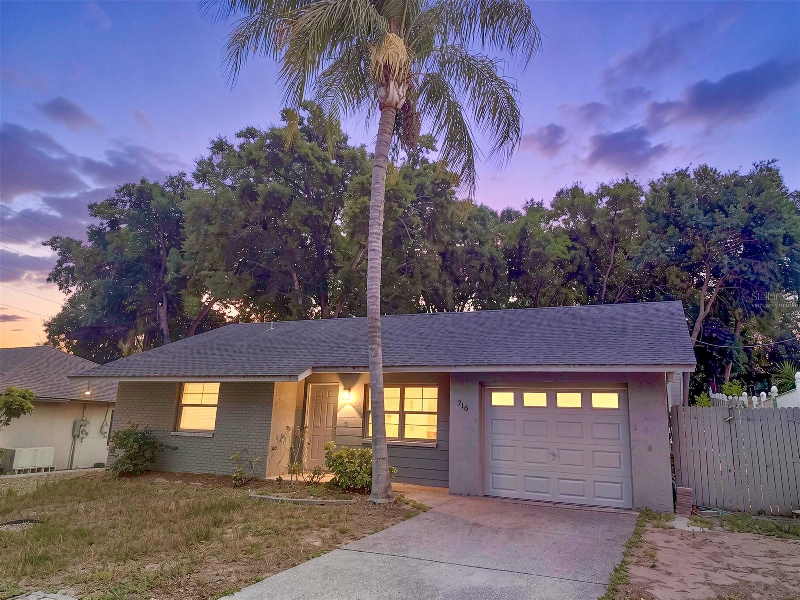 Virtually Staged. Priced to sell and AS-IS! This inviting 2-bedroom, 2-bathroom home offers 1,093 square feet of living space on a quiet DEAD-END STREET in desirable Tarpon Springs. 2023 A/C, 2014 ROOF, 2015 water heater. X flood zone - HIGH and DRY!Inside, you will find a spacious living room with vaulted ceilings and functional layout. Kitchen features granite countertops and stainless steel appliances. A little cosmetic updating, such as fresh paint and replacing the carpet, can easily transform this home and make it truly your own. Step outside to an EXTRA LARGE, FULLY FENCED backyard with endless possibilities. There’s plenty of room for your four-legged friends to roam and plenty of space for family and friends to relax, gather, and enjoy the Florida sunshine.LOCATION, LOCATION, LOCATION!!! X flood zone, short distance to charming Downtown Tarpon Springs, with its local restaurants, shops, breweries, and community events. You’ll also appreciate the proximity to variety of public and private schools. The historic Sponge Docks, Sunset Beach, and Fred Howard Park Beach are all only a few minutes away. Dog park, splash park, and pickleball courts are nearby as well. Whether you’re a first-time homebuyer, downsizing, or searching for an investment opportunity, this home offers exceptional value, a fantastic location, and endless potential. Don’t miss your chance to make it your own! Schedule your showing today.