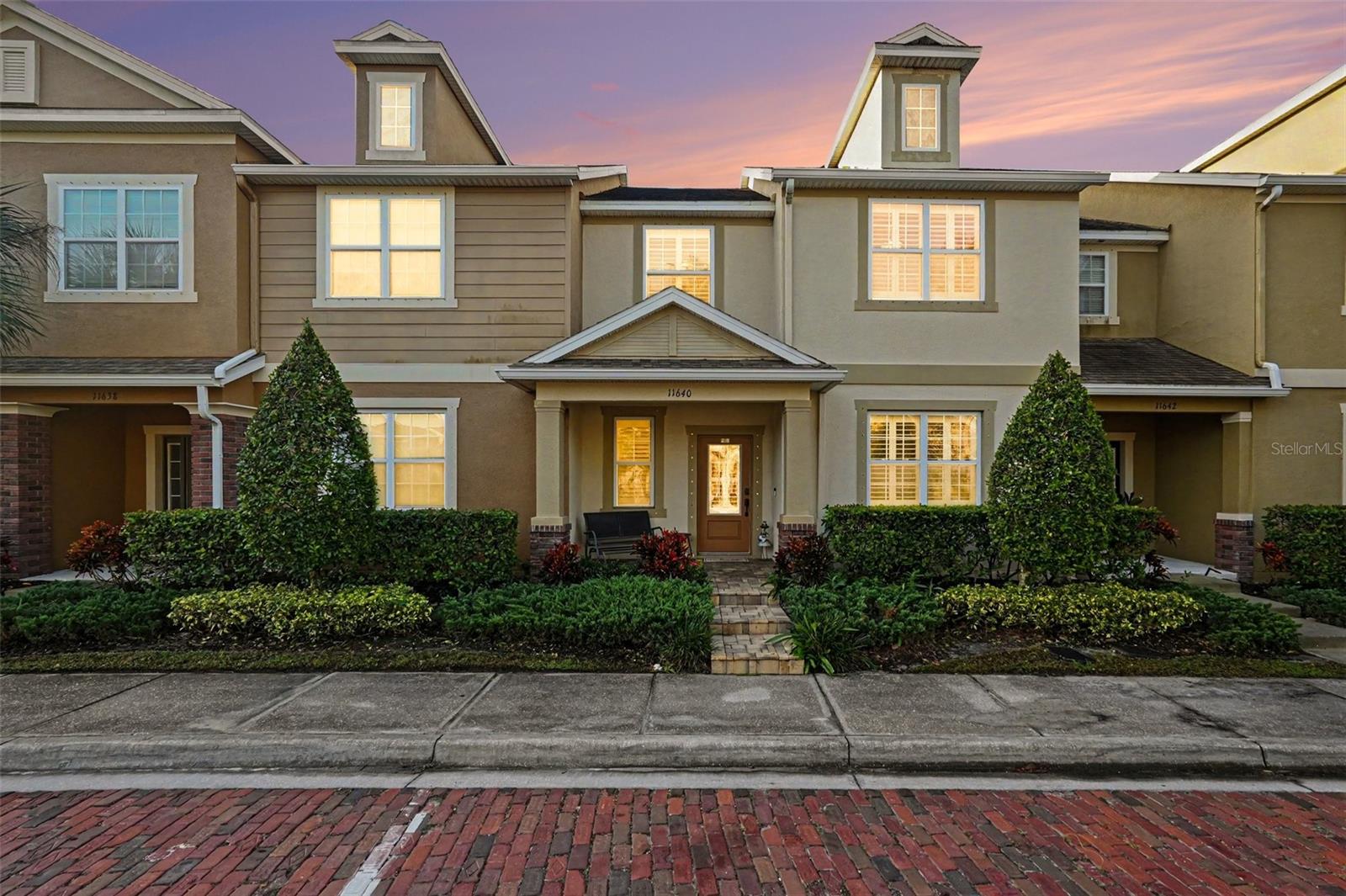 Stunning Westchase Home – Single-Family Feel with Low-Maintenance Living!Enjoy the best of both worlds in this exceptional home that lives more like a single-family residence than a townhome, without the maintenance! From the charming brick columns framing the front porch to the dramatic entry, this home offers architectural character, spacious living areas, and thoughtful upgrades throughout. A private courtyard, two-car garage, covered rear lanai, and beautifully landscaped, fenced outdoor spaces enhance the appeal.Inside, a dramatic staircase, soaring ceilings on both levels, and an open-concept design create a bright, inviting atmosphere with plenty of flexible living space. The spacious great room easily accommodates a variety of furniture arrangements and offers an ideal setting for a home office. The generous kitchen features 42-inch maple cabinets in Spice or Nutmeg, elegant Silestone countertops, an expansive breakfast bar, and abundant cabinet and counter space—perfect for everyday living and entertaining.The luxurious primary suite provides a relaxing retreat, complete with a large walk-in closet and an ensuite bath featuring dual sinks, a raised vanity, a spacious walk-in shower, and a separate garden tub. Generously sized secondary bedrooms offer flexibility for guests, family, or additional workspace.Additional highlights include plantation shutters throughout, luxury vinyl flooring on the main level, and a water softener.Ideally located in one of Westchase's desirable communities, this home offers convenient access to shopping, dining, parks, top-rated schools, Tampa International Airport, and the Veterans Expressway. Experience the space, style, and comfort of a single-family home with the convenience of low-maintenance living in a prime Tampa location!