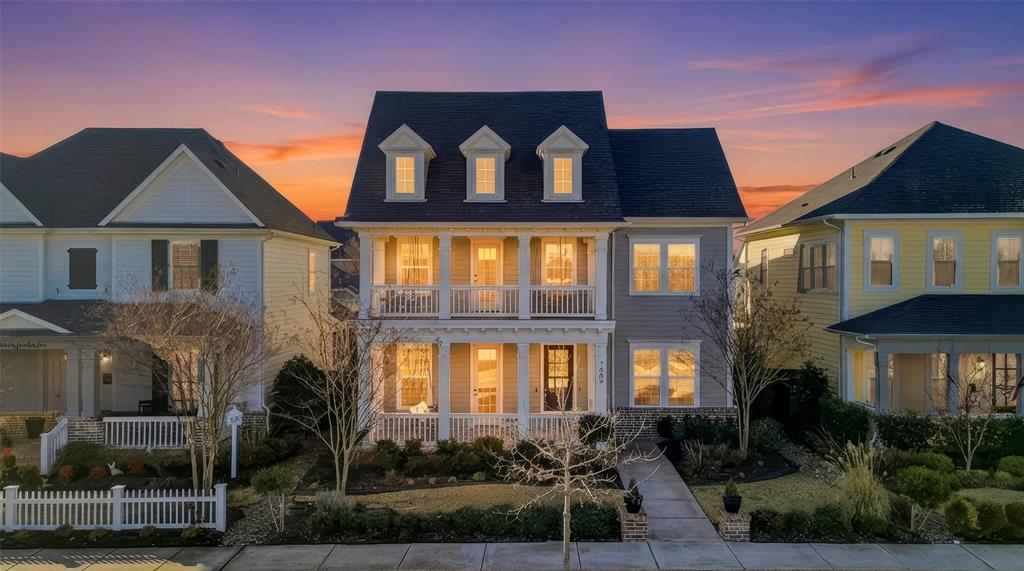 Experience the quintessential charm of Tucker Hill, McKinney’s premier master-planned community. This residence boasts incredible curb appeal with a perfect front porch and an additional second-story balcony, both featuring charming swings that convey with the property. Situated directly across from a tranquil green space with no current plans for development, this home offers a rare blend of privacy and picturesque neighborhood views from every level. Best of all, it is located within the highly sought-after, A-rated Prosper ISD.The interior features a seamless open-concept layout, integrating the gourmet kitchen, family room, and dining area, an ideal setup for modern living. The primary suite serves as a private retreat, while a second bedroom and full bath are conveniently located downstairs, perfect for guests or multi-generational living. Upstairs, you'll find a versatile media room and two additional bedrooms: one a secondary suite with an en-suite bath and walk-in closet, and another with easy access to a full hallway bath.The property is a hobbyist's dream with a 3-car garage featuring an EV charging station and a split mini air conditioner, creating a comfortable year-round workspace or gym. Outdoor living continues in the back with a covered patio and electronic screen for bug-free evenings, overlooking a backyard finished with low-maintenance artificial turf. Combining historical architectural inspiration with high-tech modern luxury, this home offers a lifestyle unlike any other.