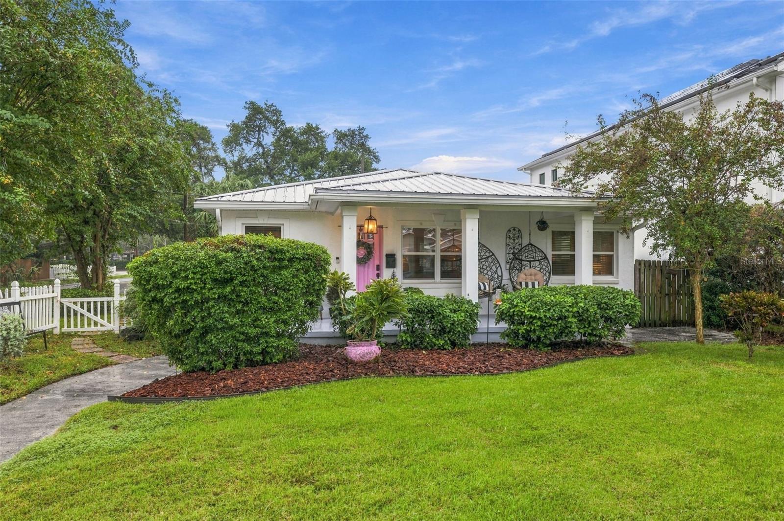 Welcome to this charming all-block, 3-bedroom, 2-bath home in the heart of Maryland Manor, ideally located in Flood Zone X and zoned for Mabry, Coleman and Plant. Just a short walk to Friendship Park, this South Tampa home combines an incredible location with the character and charm buyers love.Thoughtfully updated while preserving its original appeal, the home features beautiful hardwood floors, an updated kitchen, durable metal roof and classic white picket fence. The open family and dining rooms flow seamlessly into the galley kitchen and spacious den, creating comfortable and flexible living spaces.Outside, enjoy mature landscaping and a fully fenced yard with plenty of room to relax, play or entertain. A wonderful opportunity in one of South Tampa's most established neighborhoods, convenient to shopping, dining, Bayshore, Downtown Tampa and everything South Tampa has to offer.Please Note: backyard photos are coming.  Due to weather, we have be unable to capture yet.