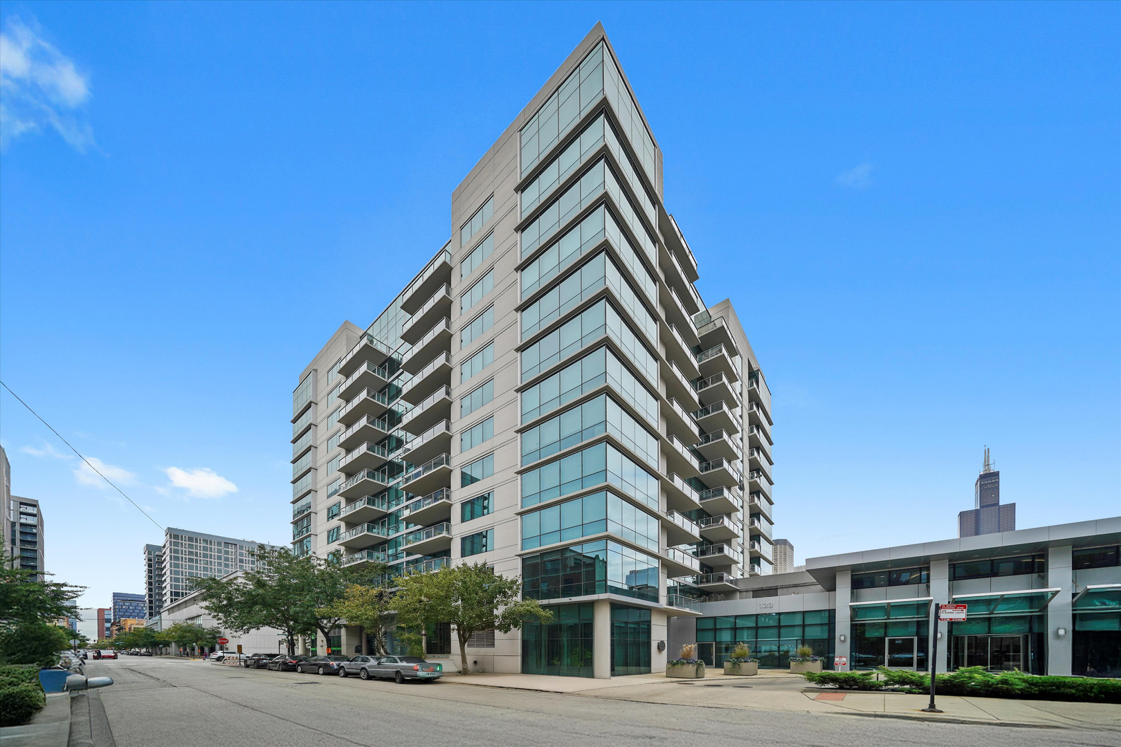 Stunning 8th-Floor Corner Unit with Skyline Views! This gorgeous 2-bedroom, 2-bath corner residence offers breathtaking east and south-facing skyline views from every angle. Enjoy the city from the comfort of your home on two private outdoor terraces - perfect for relaxing or entertaining. Spanning approximately 1,300 sq. ft., this spacious unit is move-in ready and features brand-new gleaming hardwood floors. Floor-to-ceiling windows fill the home with natural light, complementing the open-concept layout designed for modern living. The large kitchen boasts stainless steel appliances, granite countertops, and ample cabinet space. The split-bedroom floor plan provides privacy, with the primary suite showcasing stunning eastern views, a walk-in closet, and a luxurious en-suite bath with dual vanity and a walk-in shower. The second bedroom, with beautiful southern exposure, is perfect for a guest room or home office. Additional highlights include in-unit laundry, extra storage, and deeded garage parking (available for $35k). Residents of The Emerald enjoy resort-style amenities, including 24-hour door staff, a fitness center, two entertainment lounges with private bars, a business center, bike storage, package receiving, and on-site management and engineering. This pet-friendly, investor-friendly building (no rental cap) is ideally located near Randolph's "Restaurant Row," Fulton Market, Greektown, parks, grocery stores, public transit, and top-rated schools. Explore in 3D! Click the 3D button for a virtual walkthrough and experience every detail of this remarkable home.