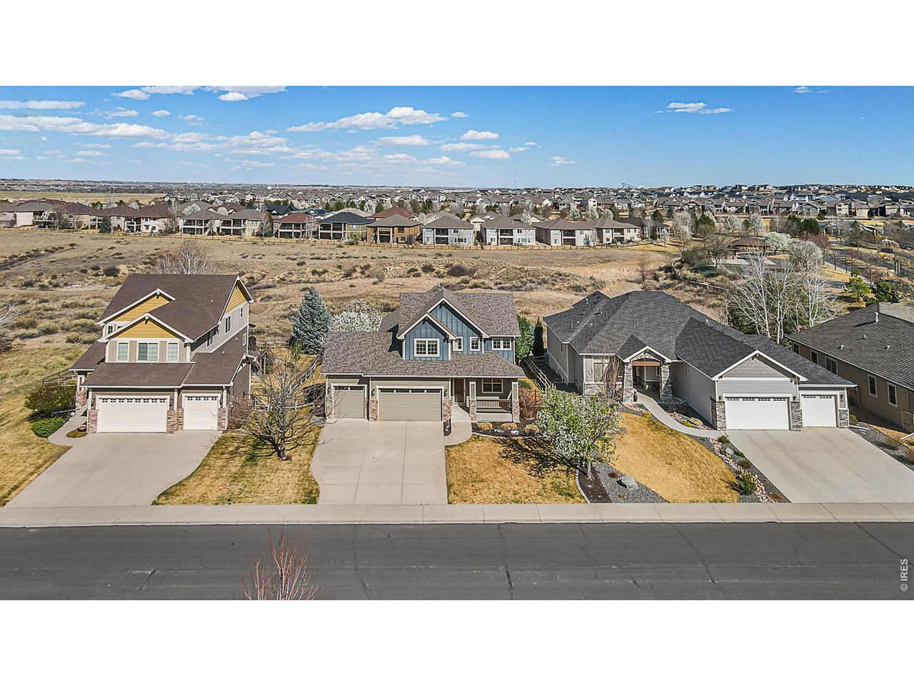 You'll be impressed by the exceptional craftsmanship, thoughtful design, and meticulous care showcased throughout this stunning home, ideally located in the highly sought-after Highpointe community-one of the area's premier neighborhoods known for its family-friendly atmosphere, open spaces, and outstanding amenities.The open-concept main living area is both elegant and welcoming, centered around a chef's kitchen featuring high-end finishes, granite countertops, and beautifully crafted cabinetry that balances style and functionality. The kitchen flows seamlessly into the formal dining room through a convenient butler's pantry-perfect for entertaining and everyday living. The main-floor primary suite offers a true retreat, complete with a spa-inspired bathroom featuring heated floors, a custom vanity, dual walk-in closets, a walk-in custom-tiled shower, and a heated towel bar for an added touch of luxury. Expansive windows fill every level with abundant natural light-including the garden-level basement-creating a bright and inviting atmosphere throughout. The versatile floor plan offers multiple living spaces across all levels, ideal for growing families, entertaining guests, or enjoying quiet evenings at home. Highpointe stands out as a premier community designed for connection and lifestyle, offering a clubhouse, resort-style pool, tennis courts, playground, and expansive open space behind every home-providing both privacy and room to enjoy the outdoors. Don't miss this opportunity to own in Highpointe at one of the best values in the community.