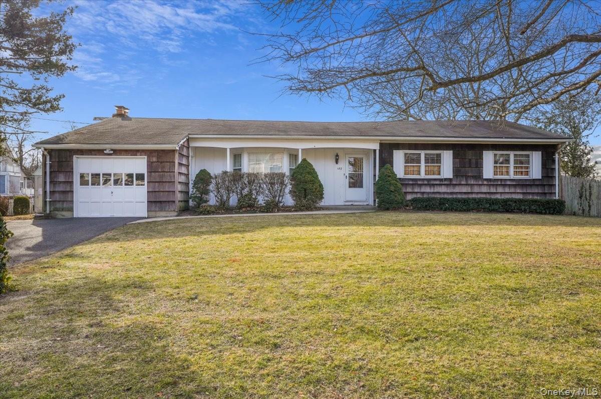 Welcome to this exceptional waterfront ranch in the desirable Idle Hour community of Oakdale. Offering 1,814 sq. ft. of thoughtfully designed living space, this home provides an ideal opportunity to enjoy true Long Island waterfront living with direct canal access just moments from the Connetquot River and the Great South Bay—no bridges to navigate. Step inside to a spacious layout featuring wood flooring, an open living room with a bay-window bump-out and an adjacent dining room perfect for gatherings. The kitchen offers a breakfast bar, wall oven, and abundant natural light from another bay-window bump-out. The cozy family room, complete with a classic brick wood-burning fireplace offers warm canal views and a perfect place to unwind. The owner’s suite includes a walk-in closet and private bathroom with a walk-in shower. Two additional bedrooms, a full guest bathroom completes the sleeping wing. A dedicated laundry room provides everyday convenience.Step outside to your own waterfront oasis with desirable southern exposure, a deck, dog run, 80 feet of bulkhead, and two finger docks suitable for vessels of various sizes. The property also features a natural boat ramp, offering convenient on-site launching and retrieval for smaller boats, kayaks, or personal watercraft. Boaters will appreciate direct, effortless access to open water, making this an ideal home for those who truly love life on the water. A 1-car garage offers added storage with utilities conveniently positioned at the rear.Set within the scenic Idle Hour community along the Connetquot River, this home offers a rare chance to live in one of Oakdale’s most historic and picturesque neighborhoods. Once part of the famed Vanderbilt estate, Idle Hour is celebrated for its natural beauty, waterfront setting, and close proximity to marinas, parks, dining, entertainment, shopping, and the Oakdale LIRR station—ideal for commuters and weekend explorers. Optional amenities include membership at the private Idle Hour Beach Club - offering pools, a clubhouse, beach access, and marina or Byron Lake Park with its modern pool complex and recreational facilities.Experience the perfect blend of lifestyle, location, and Long Island charm. Don't miss this rare opportunity—Call today for a showing!