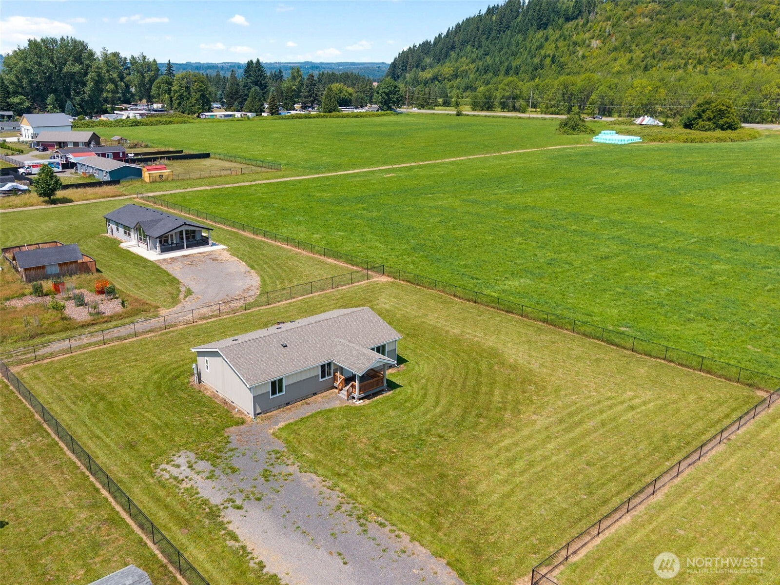 Don’t miss this bright, modern 2022 built home on a generous half acre lot in the peaceful community of Mossyrock. This move in ready home offers a desirable open concept layout with vaulted ceilings, abundant natural light, & modern finishes throughout. The spacious kitchen features ample cabinetry, generous counter space, stainless steel appliances, & flows seamlessly into the dining & living areas, making it ideal for everyday living & entertaining. Featuring 3 bedrooms & 2 bathrooms, the private primary suite includes a spa inspired en suite bathroom, built in vanity nook, & walk in closet. The level, partially fenced half acre lot offers room for gardening, outdoor activities, a future shop, or RV parking. Enjoy the convenience of in town services while maintaining a peaceful small town setting. Conveniently located just minutes from schools, parks, shopping, restaurants, medical services, & everyday amenities. Just minutes from Mayfield Lake & Riffe Lake, you'll enjoy boating, fishing, hiking, camping, & year round recreation. Whether you're looking for a full time residence or the perfect Pacific Northwest retreat, this home offers comfort, convenience, & an exceptional location.
