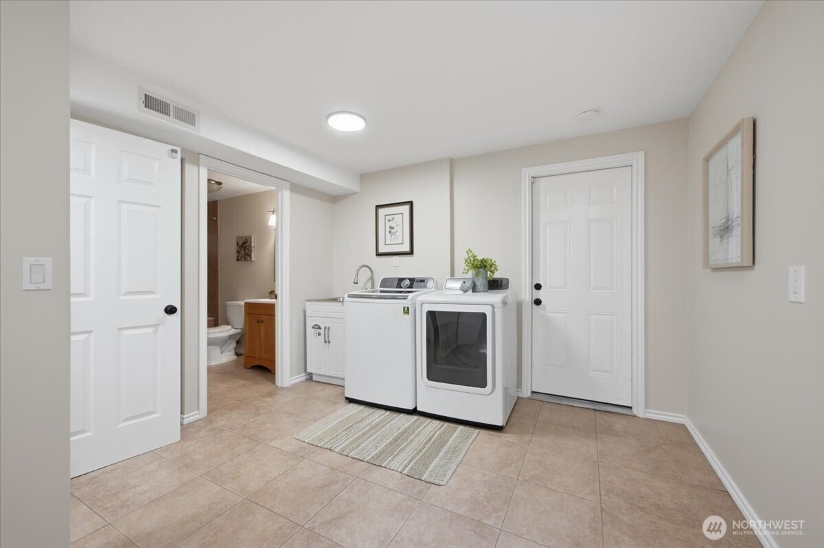 HUGE lower level laundry/mud room