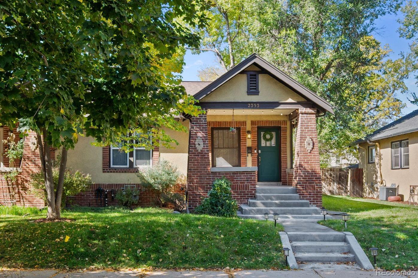Discover the charm of this delightful half-duplex at 2353 South Lincoln Street, nestled in the desirable Rosedale neighborhood of South Denver. Situated on a quiet street, this home welcomes you with its inviting front porch, classic brick, and modern updates throughout. Step inside to find hardwood floors that bask in abundant natural light. The main level features a spacious family room and space for a dining area, a primary bedroom and full bathroom on the main level, in addition to a flex space off of the kitchen that can easily be transformed into an office or den. The kitchen is a modern culinary haven, equipped with newer stainless steel appliances featuring a gas range and sleek granite countertops. The main floor bathroom has been thoughtfully updated, enhanced by a skylight that fills the space with light. Downstairs, the finished basement provides a versatile flex space at the bottom of the stairs, another spacious bedroom with an egress window, large enough to fit a king bed, and a full bathroom. The basement also includes a convenient laundry room, complete with a washer and dryer and utility sink. Outside, enjoy a private fenced yard with a sprinkler system-perfect for outdoor gatherings or relaxation. Recent updates enhance the home's comfort, including a new forced air and central AC system installed in 2020 on the main level, new water heater in 2025, and new paint throughout the interior. The property also features a newly constructed back fence, front porch, steps, walkway, and a sump pump, all installed in 2024, as well as masonry work just completed around the exterior. This home also features a detached 1 car garage! Embrace the perfect balance of comfort and style in a neighborhood in the heart of it all! Located a short distance to South Broadway and all that it has to offer-bars, restaurants, and coffee shops. Less than .5 mile to Harvard Gulch, ~1 mile to South Pearl and Downing and a short drive to Washington Park and Downtown Denver!