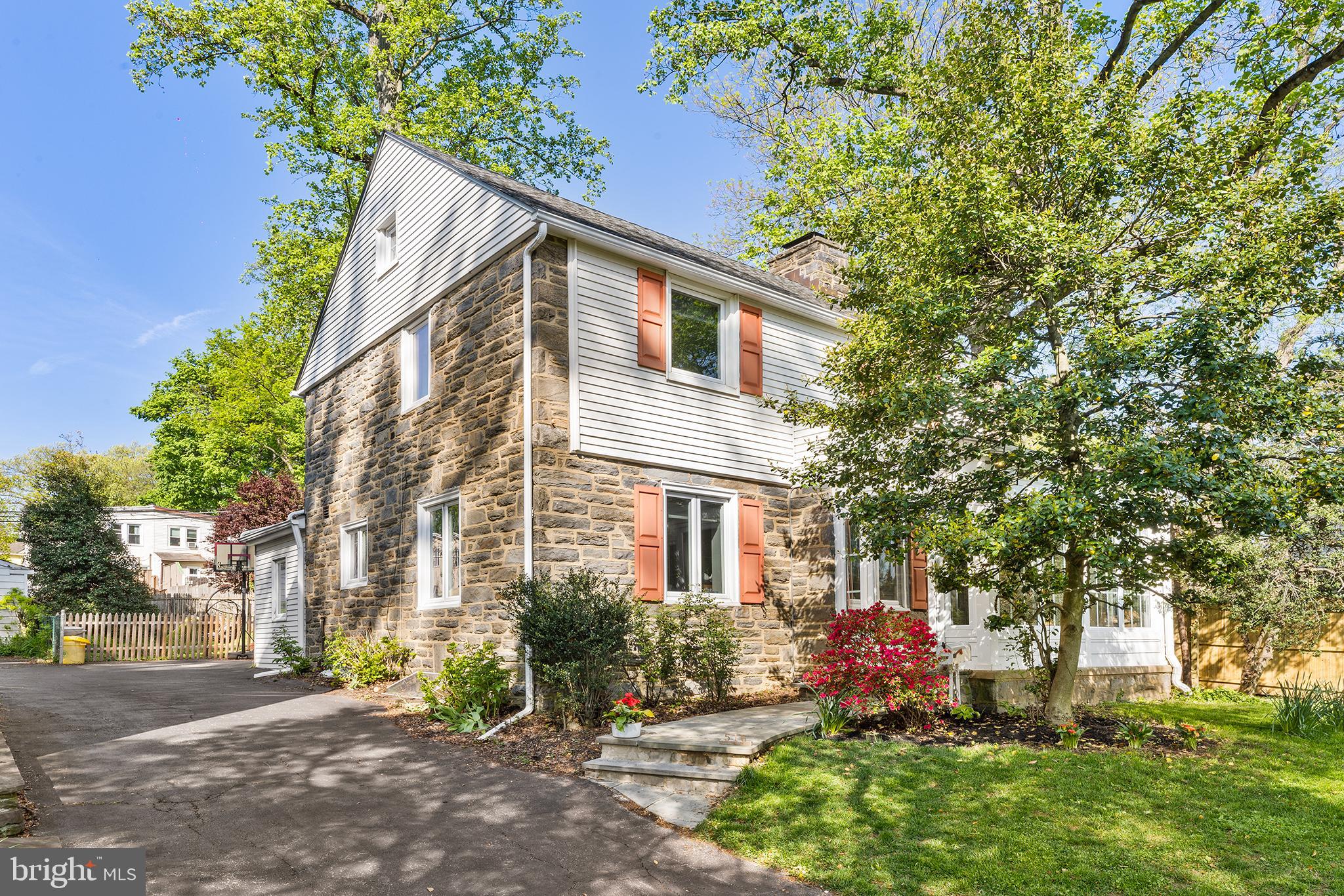 Gorgeous Narberth home....516 Berkley Road ideally nestled in one of Lower Merion  most sought-after neighborhoods where you can walk to everything this charming town has to offer.This classic colonial features four spacious bedrooms and is situated at the end of a picturesque street, surrounded by lush perennial gardens and mature landscaping that create a warm and inviting first impression. A custom flagstone walkway leads to a welcoming enclosed front porch, where expansive windows showcase the beauty of the surrounding landscape year-round.Step inside to a bright and inviting living room anchored by a wood-burning fireplace. Beautiful newer flooring and oversized windows fill the home with natural light, creating a seamless flow into the formal dining room and the expansive, newly renovated chef’s kitchen. Designed for both everyday living and entertaining, the kitchen boasts abundant custom cabinetry, generous counter space, and premium appliances.Just beyond the kitchen, the spacious family room opens directly to a covered rear patio and a beautifully leveled backyard—perfect for entertaining, relaxing, or enjoying outdoor gatherings. A convenient first-floor powder room and a versatile room, ideal as a home office, playroom, or den, complete the main level.Upstairs, the serene primary bedroom offers abundant natural light and ample closet space. Two additional generously sized bedrooms and a beautifully renovated hall bath complete the second floor.The third level features a private fourth bedroom with its own full bath, flooded with natural light and offering charming neighborhood views—an ideal guest suite, teen retreat, or private home office.The lower level provides a dedicated laundry area, ample storage, and endless possibilities for a recreation room, fitness area, workshop, or additional living space.Perfectly located in the heart of the Main Line, this exceptional home is just a short stroll to Narberth’s vibrant shops, restaurants, parks, and train station, providing easy access to Center City Philadelphia. All of this is complemented by the award-winning Lower Merion School District, making this a truly special place to call home. Welcome Home