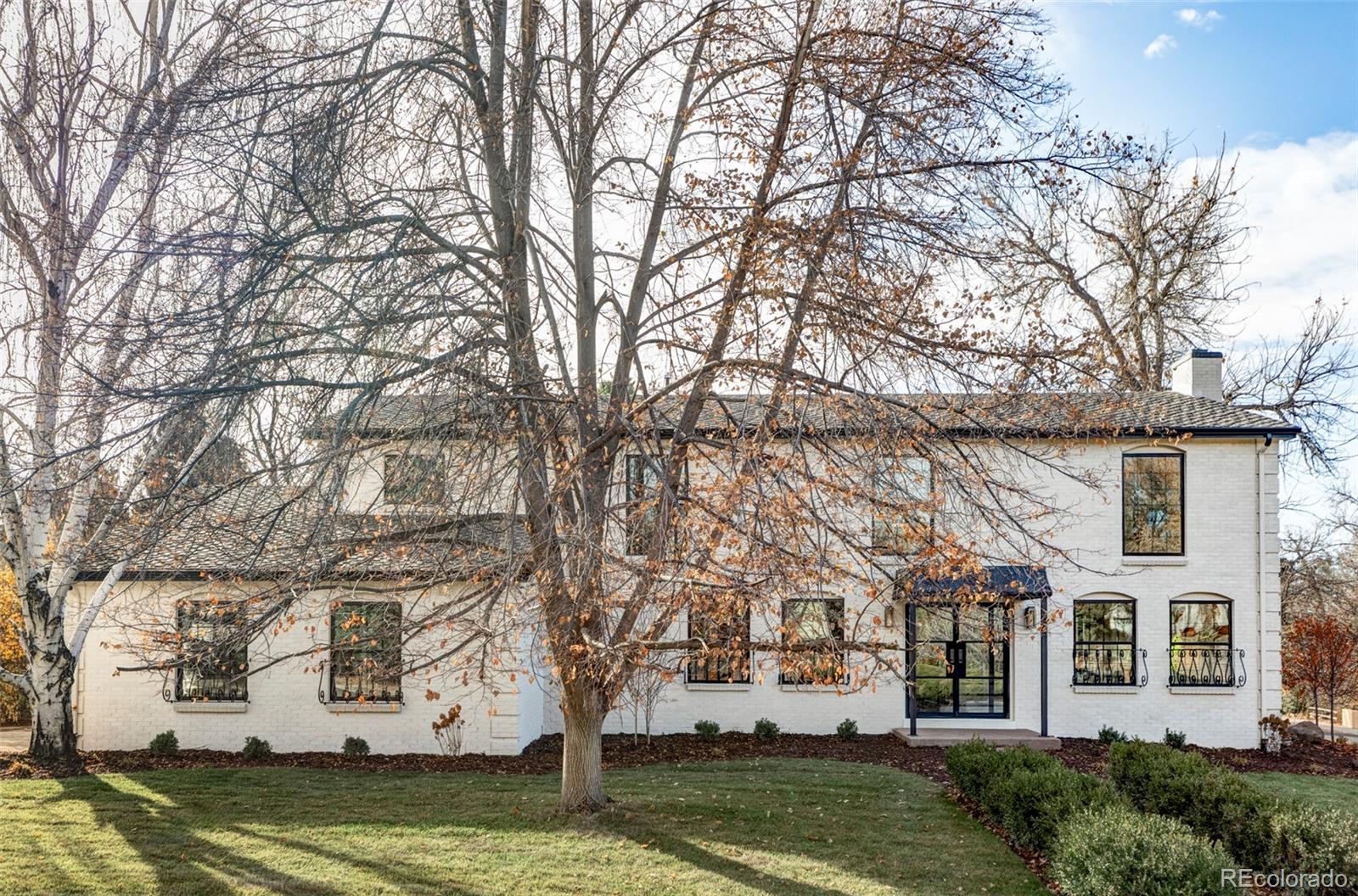 Welcome to an impeccably reimagined residence in the coveted enclave of Cherry Hills—an extraordinary home that seamlessly blends timeless elegance with modern sophistication. From the moment you step inside, the grand foyer sets an impressive tone, unfolding into a striking living room with soaring vaulted ceilings and a generously scaled formal dining room ideal for hosting at any level.At the heart of the home lies an exceptional chef’s kitchen—an entertainer’s dream—anchored by an expansive island and framed by bespoke two-tone cabinetry, impeccable finishes, top-tier appliances, and abundant storage. Flanked by two inviting living areas, the space offers both warmth and versatility for everyday living or effortless entertaining.Upstairs, a private office is thoughtfully tucked away on its own wing, creating an ideal retreat for work or creativity. Down the hall, two beautifully appointed bedrooms share a full bath designed with refined detail. The primary suite is a true sanctuary: spacious, serene, and complemented by a spa-caliber bath featuring dual showers, a sculptural soaking tub, and an expansive walk-in closet.The lower level extends the home’s impressive livability with two additional bedrooms, a stylish full bathroom, a generous recreation area, and a stunning wet bar complete with dual wine coolers—perfect for gatherings large or small.Step outside through sliding glass doors to a covered patio overlooking a newly landscaped backyard, offering a peaceful outdoor haven for dining, relaxing, and entertaining. *A brand new privacy fence as been added to the back yard!*