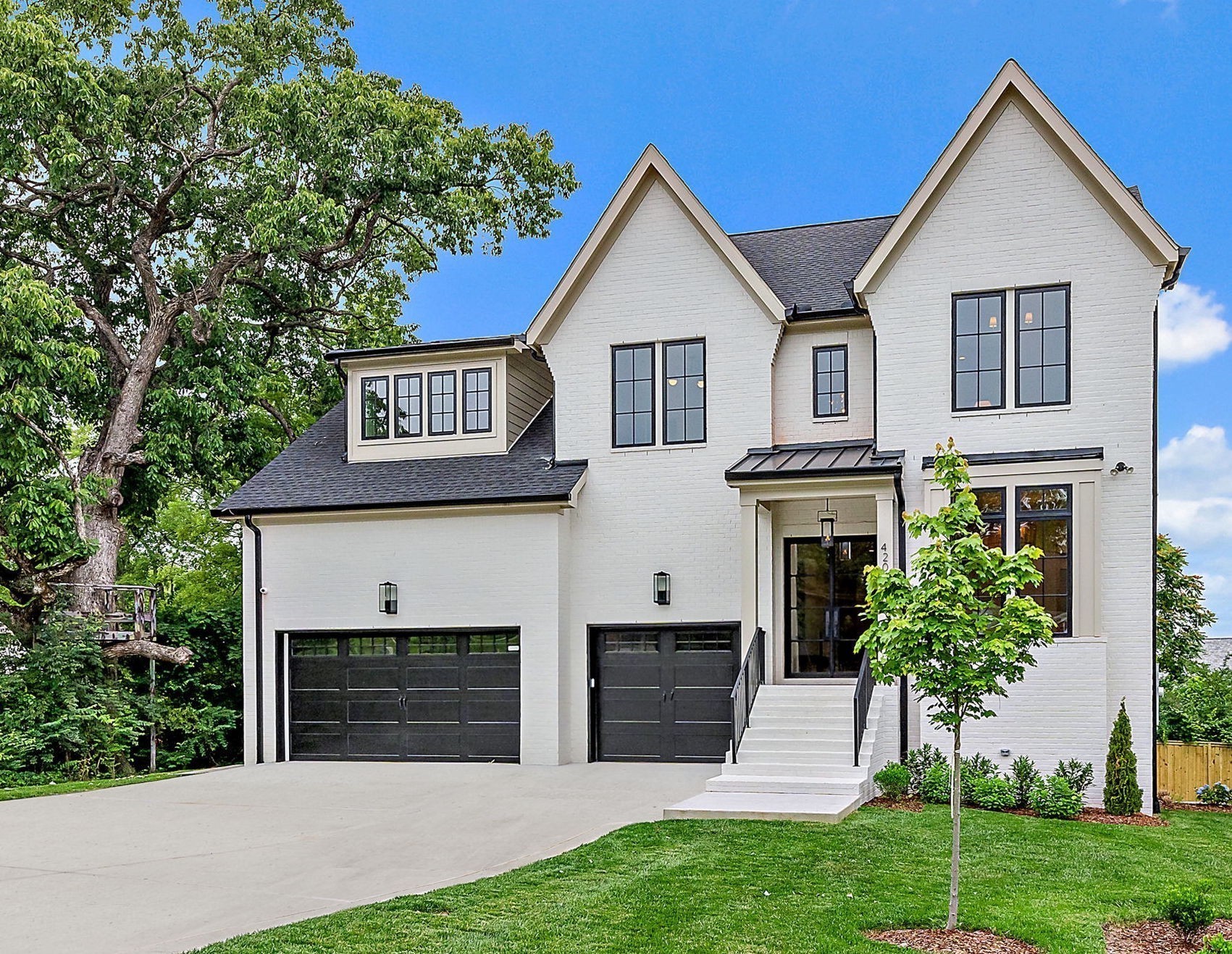 12 x 24 Gunite Pool Included!  Step into luxury living in the heart of Green Hills! Walk to high end restaurants and shopping.This contemporary masterpiece boasts soaring ceilings and an open-concept layout. Two main-level bedrooms, including an Owner’s Suite and en suite, offer both comfort and privacy. Designed by Makenna Brooke Designs, each room showcases exquisite custom detailing. The gourmet kitchen is a chef’s dream with high-end appliances and a hidden pantry. Entertain with ease from the wraparound screened porch, extending from the Dining Room to the Great Room. Enjoy the indoor and outdoor fireplaces for cozy gatherings. Upstairs, you’ll find two additional bedrooms and a bonus room, perfect for guests. The lower level has a private entrance and offers two more bedrooms and media room with wet bar. Conveniently located near 440, enjoy easy access to Green Hill’s amenities, and just 10 minutes to downtown Nashville.