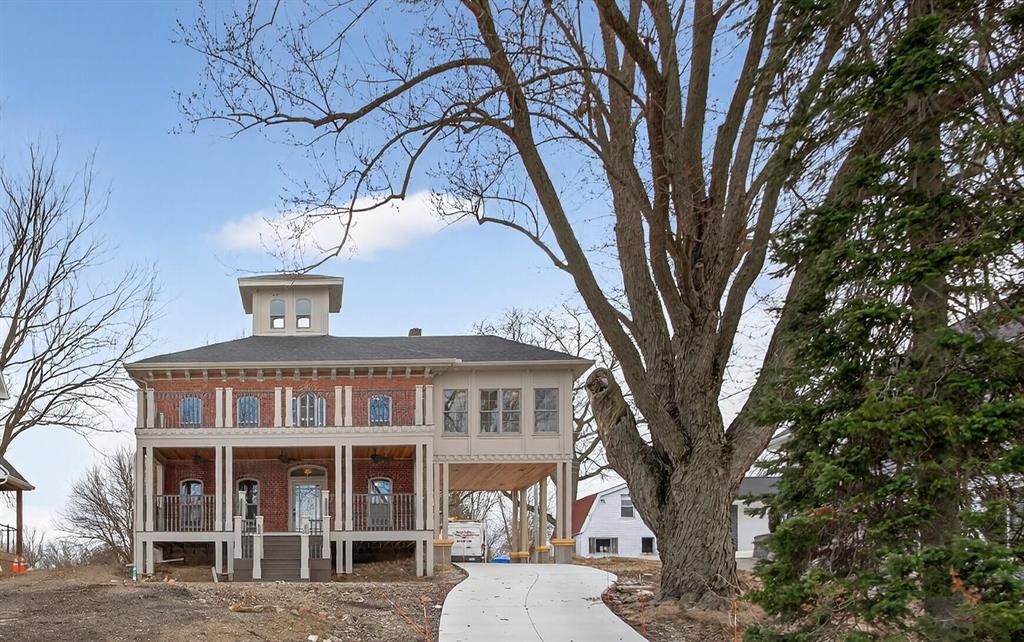 Stunningly re-imagined 1840 ''Towne House'' showcases panoramic, elevated views across coveted Round Lake from an exceptionally rare, waterfront parcel. A masterful, studs-out renovation marries timeless charm--original stonework, period trim, classic gables with a fresh, family-forward floor plan tailored for effortless, year-round living. Every major system is brand-new: high-efficiency HVAC with AC, updated electrical & plumbing, new insulation, and energy-smart windows ensure modern comfort without compromising history. Indoors, sun-splashed living spaces flow to the kitchen and lake-view dining; outdoors, expansive lawns cascade to 58 ft. of pristine frontage, perfect for swimming, boating, and sunset bonfires. Whether weekend retreat or full-time haven, 3951 Woerner Rd delivers the quintessential Michigan lake-home lifestyle on one of Round Lake's most extraordinary lots! Ready for immediate enjoyment and generations of memories.