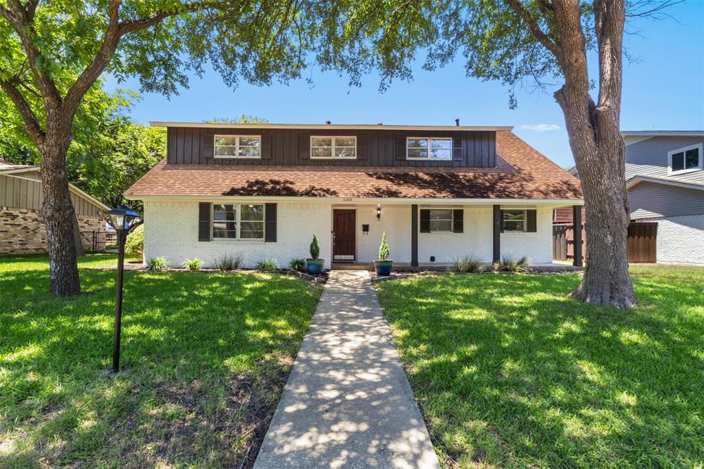 Welcome Home to 11319 Dumbarton Dr in Dallas, TX! This charming 4-bedroom, 2.5-bath residence is ready to steal your heart. Nestled on an oversized lot spanning nearly a quarter of an acre, this beautifully updated home offers 1,936 square feet of thoughtfully reimagined living space that blends modern comfort with timeless character.Step through the welcoming front porch and into a spacious living area anchored by a striking brick wood-burning fireplace. Durable laminate and tile flooring flow seamlessly throughout the common areas, while the kitchen shines with granite countertops, updated cabinetry, a stylish backsplash, and electric appliances. Upstairs, all four bedrooms provide a private retreat with plush carpeting underfoot, creating a cozy separation between your living and sleeping spaces.Outside, the magic continues. Mature trees frame the property with undeniable curb appeal, while a covered patio beckons you to enjoy lazy weekend afternoons. The alley-access two-car garage adds both convenience and extra flexibility for your outdoor space.The neighborhood truly elevates this property. Located just minutes from Cotillion Park on Barnes Bridge Road, you'll enjoy easy access to green space, scenic walking paths, and community recreation. Proximity to major freeways keeps shopping, dining, and entertainment well within reach, making daily errands and weekend adventures effortless.Whether you're searching for a forever home or an exceptional investment in one of Dallas's most accessible neighborhoods, 11319 Dumbarton Dr delivers on every front. Schedule your showing today!