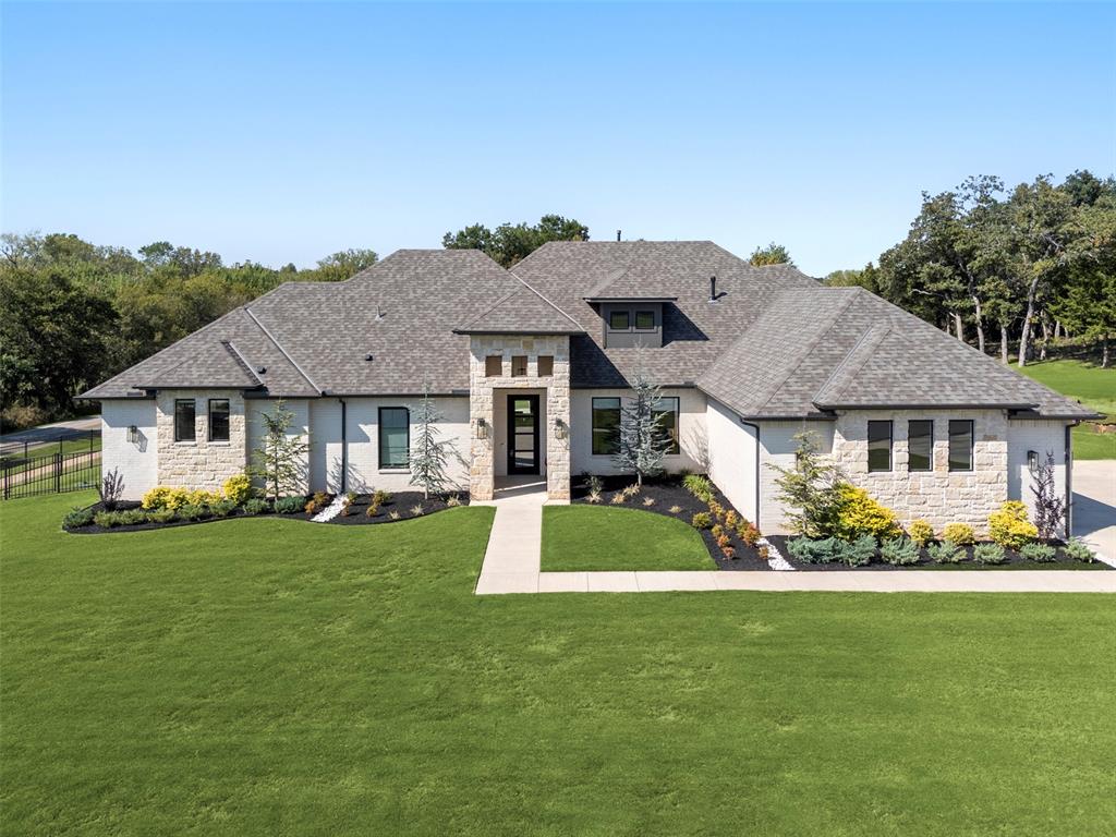 OPEN HOUSE FRIDAY, October 3rd 12:00 - 6:00, SATURDAY, October 4th 12:00 - 6:00, SUNDAY, October 5th 12:00 - 6:00.  Welcome to 9401 Autumn Park, a beautiful single-story home in a gated neighborhood featuring 4 bedrooms, an office, a flex room, 4 full bathrooms, and a half bath. The open living area boasts cathedral ceilings, rich wood tones, and an impressive fireplace. The chef’s kitchen includes a huge island, quartz counters, leathered granite accents, high-end appliances, a butler’s pantry, and a wine bar. A stunning accent wall highlights the front room, currently used as a second living space but easily suited for a formal dining room. Step outside to the covered patio with outdoor kitchen, perfect for entertaining. The luxurious primary suite offers dual vanities, a tiled shower, a soaking tub beneath a crystal chandelier, and a spacious walk-in closet. Additional bedrooms, a flex room, and private office with stained doors provide versatility. Located in Oakdale schools with easy access to I-35, this home blends elegant finishes with a prime location.