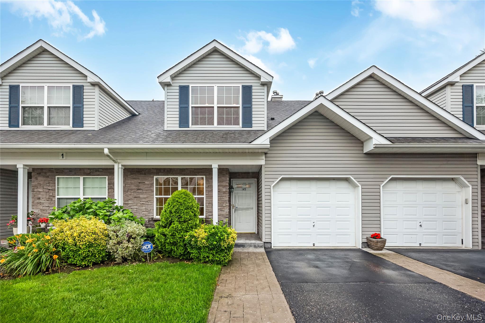 Welcome to this beautifully appointed 2-bedroom, 2.5-full-bath home in the prestigious 55+ Island Landing community. This highly sought-after residence features custom wainscoting throughout the hallway and stairwell, elegant crown molding, and hardwood floors to the den. Cathedral ceilings and an open-concept floor plan create a bright, spacious atmosphere, seamlessly connecting the kitchen and family room.The updated kitchen boasts modern appliances, a stylish tile backsplash, and ample space for entertaining. Thoughtfully designed for comfort and accessibility, the home also includes a motorized chair lift providing convenient access to the second floor.Step outside to enjoy professionally landscaped grounds and a beautiful brick patio overlooking pristine golf course views—the perfect setting for relaxing or entertaining.Located in the prestigious and highly desirable Islip Landing 55+ community, this exceptional home offers comfort, elegance, and low-maintenance living in a premier location.