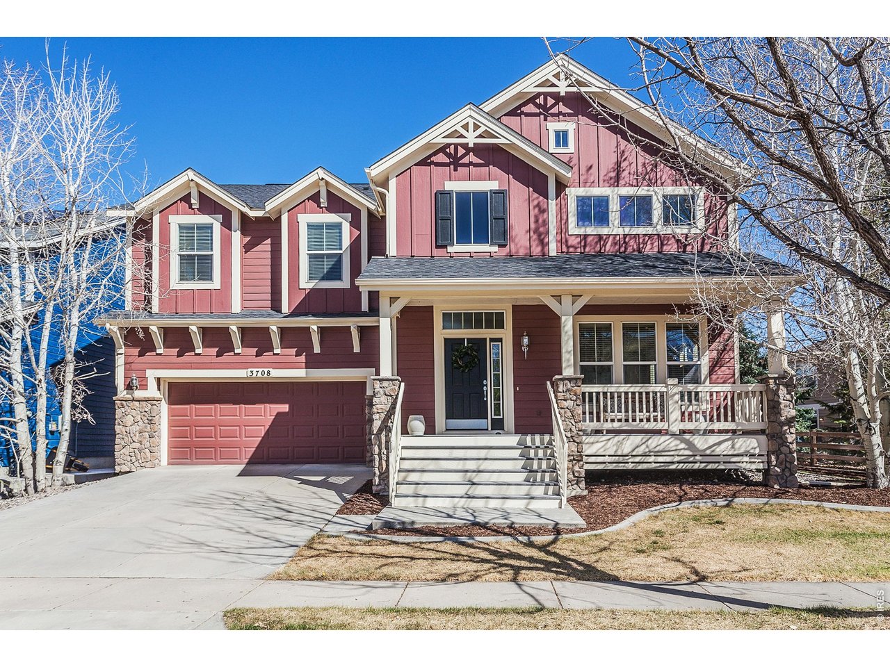 Beautifully bright, open, and meticulously maintained two-story home in the desirable Observatory Village community of southeast Fort Collins. Tall ceilings and abundant natural light welcome you into an airy living space with an elegant staircase. The front room, ideal for a piano or quiet reading area, flows into the dining room-perfect for gatherings-and features built-in bookshelves and recessed nooks for furniture and storage. True 3/4" hardwood floors lead to a well-appointed kitchen with abundant cabinetry, tile backsplash, generous counter space, pantry, and a convenient breakfast bar/island for casual meals and food prep. Vaulted ceilings and light continue into the living room, centered by a gas fireplace and an oversized picture window. A discreet home office off the main living area easily accommodates two workstations and includes extra outlets and network access. The private backyard is one of the larger lots in the neighborhood, low-maintenance and thoughtfully landscaped, with "pet friendly edging", an expansive patio for grilling and relaxation. The wide staircase ascends to a built-in workstation and open railing overlooking the family room and neighborhood, creating separation between the primary suite and three guest bedrooms. The primary suite is spacious and bright with a tray ceiling, two walk-in closets, and a five-piece bathroom with new flooring. All three secondary bedrooms are generous in size and share an updated guest bath with a walk-in shower. The upper level also features built-in linen storage and a dedicated laundry room. Practical updates include an updated HVAC system, a newer Class 4 roof, and recent exterior paint. Don't miss the hidden garage storage adds convenience. Wired for surround sound and ethernet. Full unfinished basement for future expansion. HOA amenities include access to a neighborhood pool, an incredible splash pad, and the famous community observatory. Click on video/virtual tour for more details.