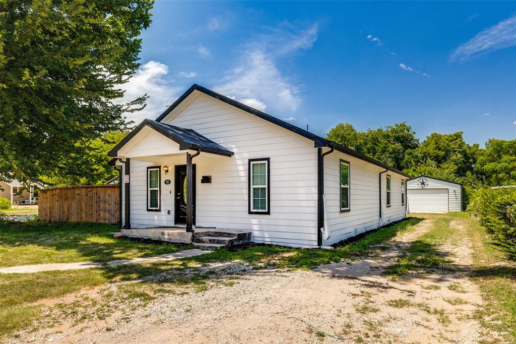 This charming 3-bedroom, 2-bathroom home offers a warm and modern living space with thoughtful upgrades throughout. Completely remodeled from the foundation up in 2021. Step inside to find an inviting open-concept layout, seamlessly connecting the living room, dining area, and kitchen. The living room boasts sleek recessed lighting, neutral-toned walls, and rich wood-look flooring that continues throughout the main living areas. The kitchen is bright and stylish, featuring crisp white cabinetry, stainless steel appliances, a center island with bar seating, and granite countertops. It’s a perfect space for entertaining or preparing meals for family and friends. The bedrooms offer ample space, while the bathrooms match the home’s clean, updated aesthetic. Ideal for families or anyone seeking a move-in-ready space with a modern feel, this home combines comfort, convenience, and style in every corner.