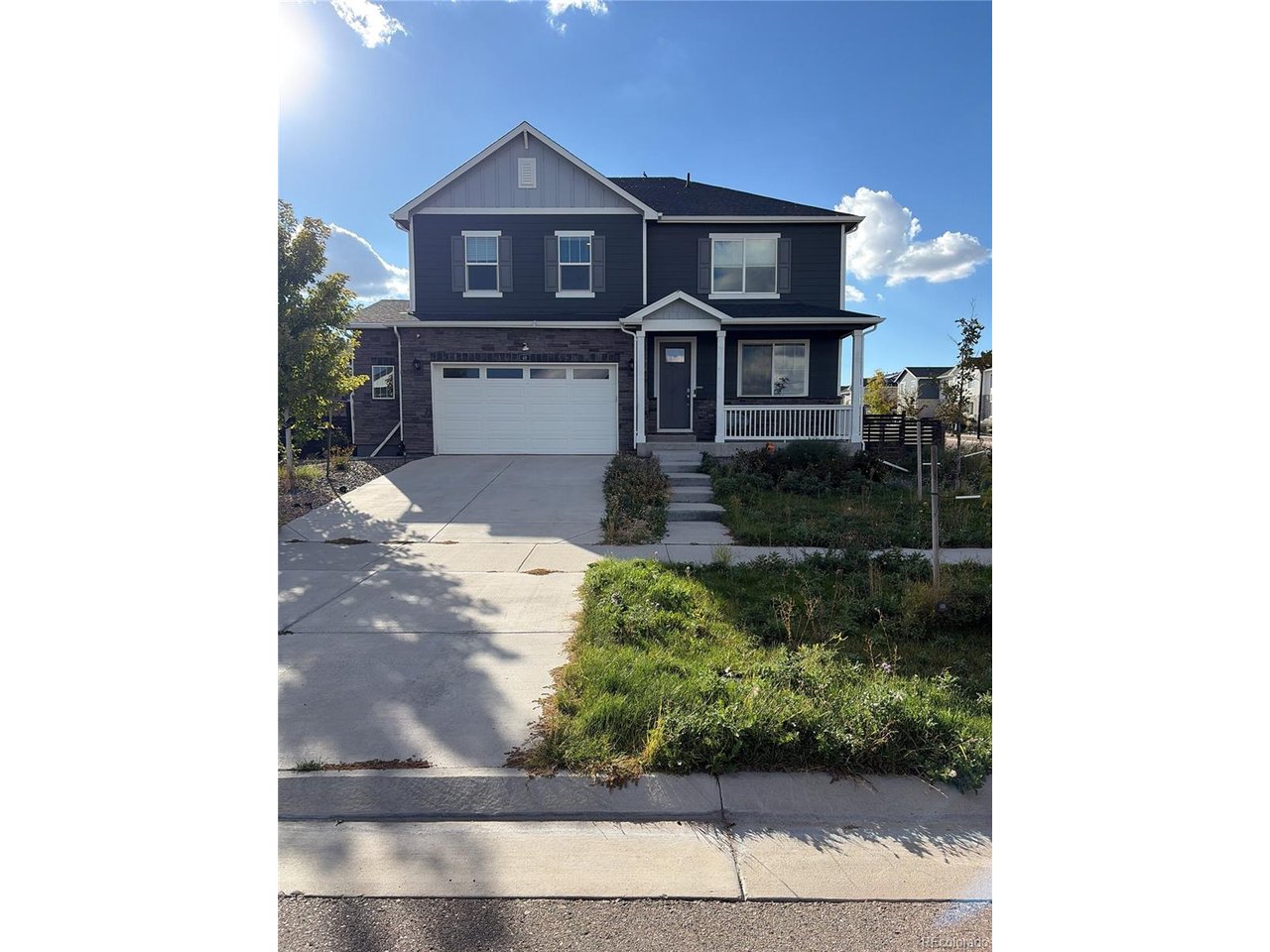 Come check out this corner lot in the Harmony subdivision. The home is situated on a large lot and boasts 5 bedrooms and 3 bathrooms across two levels of living space. Enjoy high ceilings, a large garage, tankless water heater and large unfinished basement. Take advantage of all the amenities in the community and schedule your showing today!