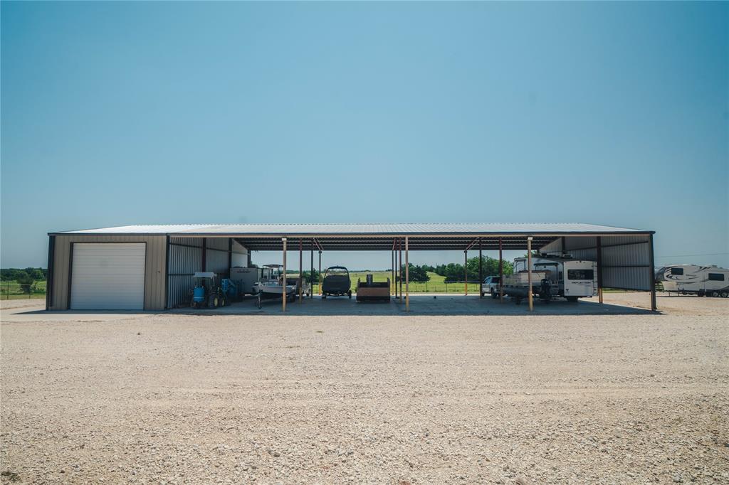 Commercial business opportunity on 20 acres, with Barndo near Lake Texoma. Established RV and boat storage operation with 16 covered spaces and over 20 uncovered spaces, plus a 1,600 SF shop and warehouse built in 2023. Also includes a 2021 barndominium, pond, and private well on paved FM 901. Business, land, and home in one package.BUSINESS OPPORTUNITY. Established RV and boat storage business with room for a new owner to raise occupancy and expand. The 2023 shop and warehouse suits storage, boat and RV service, equipment, or a trade business. A bus at the front of the property adds flex space for an office, storage, or guest use. Live work setup lets you run the business from home.LAND. 20 ag exempt acres with a pond, private well, and paved FM 901 frontage for easy access and visibility. Room to add more storage spaces or other improvements.BARNDOMINIUM. Well maintained 2021 barndominium, ideal as a full time home, weekend retreat, or hunting and fishing getaway. A flexible bonus room works as a second bedroom, home office, guest space, or hobby room.LOCATION. Close to Lake Texoma boating, fishing, hunting, golf, casinos, and RV recreation.FINANCING. Owner financing available to qualified buyers only if terms meet seller requirements.VALUE. Rare value for a property with land, home, and income producing business in place. The 2023 commercial improvements, finished barndominium, and operating storage business would cost far more to build today. Buyer to verify all information including acreage, ag exemption, and income.Cross listed in Residential Farm and Ranch MLS 21314768.Buyer and Buyers Agent to independently verify all information, measurements, financial and business information, income, expenses, occupancy, leases, zoning, restrictions, permitted uses, utilities, agricultural exemption, expansion potential and any other information deemed important to Buyer.
