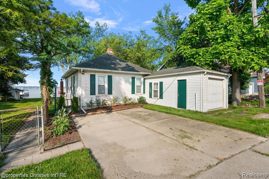 Incredible opportunity to own the perfect lakefront property with approximately 60ft of pristine frontage and picturesque views year-round on the north side of highly sought-after, all-sports Whitmore Lake! *Immediate occupancy with more than half of the summer season still ahead!* Offered at a phenomenal value with crystal-clear Pure Michigan lake frontage floating across a clean sandy bottom with minimal maintenance and an extended private dock, this property features a conventionally-shaped 135ft deep parcel with a well-kept dwelling that was fully gutted and remodeled in 2010 - versatile and suitable for those looking to live on the lake, own a second home/lake-house at an extremely affordable price, or build custom with a massive building-envelope and endless possibilities! Embrace coziness and tranquility with a beautiful, open dwelling with vaulted great room ceilings, updated kitchen with granite counters and stainless steel appliances, two full updated bathrooms, two fireplaces, three spacious bedrooms and an attached garage - sprawling fenced yard perfect for dogs, children, parking, entertaining, outdoor activities and summer fun! Embrace the "Up North" lifestyle while still being conveniently close to everyday amenities and only minutes from Downtown Ann Arbor! A rare find in today's market that will not last!