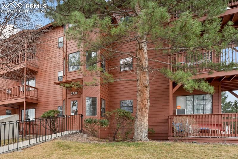 Have you been looking for the perfect 55+ community with main-level living and elevator access? Look no further! You won't be able to top this end unit that has been immaculately maintained and is flooded with natural light. You'll love the large covered deck that wraps around the corner of the unit creating for 120 square feet of enjoyable space facing the east and north sides allowing for sunlight as you sip your morning coffee and cooler temps during the warmer summer months. Upgraded Pergo flooring in the kitchen, dining and bathroom was recently added. The kitchen has a breakfast counter for serving up family and friends along with a sizable dining area, and opens up onto the living room with sliders out onto the covered deck. Storage, you ask? You'll find plenty of that with all the pantry-style cabinetry off the dining and kitchen area. Two good-sized bedrooms with ample closet space is appealing within this well-planned layout.  And the full bathroom is an impressive size. Laundry? Yes! You'll love having your own large laundry room within the unit versus many complexes where you have to share access to the laundry. Not here! Enjoy the beautiful grounds and the clubhouse for larger gatherings. This home is so incredibly convenient to everything you'll need whether that be grocery marts, coffee shops, public transportation, etc.  The location is central to Colorado Springs and within just a few miles of downtown. From your assigned parking space, you can easily access the back stairs, and this unit is the first one when you get to top of the landing, making it an easy walking commute.  But if you prefer the elevator for even more convenient travel, there is access down the hallway within easy reach. This property is the perfect combination of down-sizing, while still allowing you to create a comfortable space to make you feel right at home. Units like this are tough to find in Colorado Springs. Don't let this one pass you by!