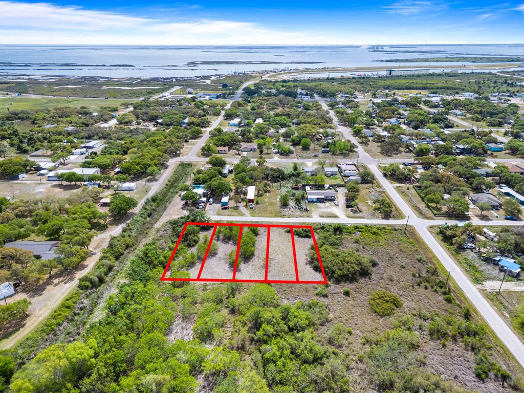 Cleared and Ready! Seller has confirmed that water and sewer is nearby so start planning your house/s today! 5 lots sold as a bundle! Total lot size is 250'x140' (each lot 50'x140' deep) This location is ideal, close to downtown Aransas Pass, Conn Brown Harbor and a great fishing. I little longer in the car and you'll be at Port Aransas in no time. Feel free to walk around and start visualizing your next build.