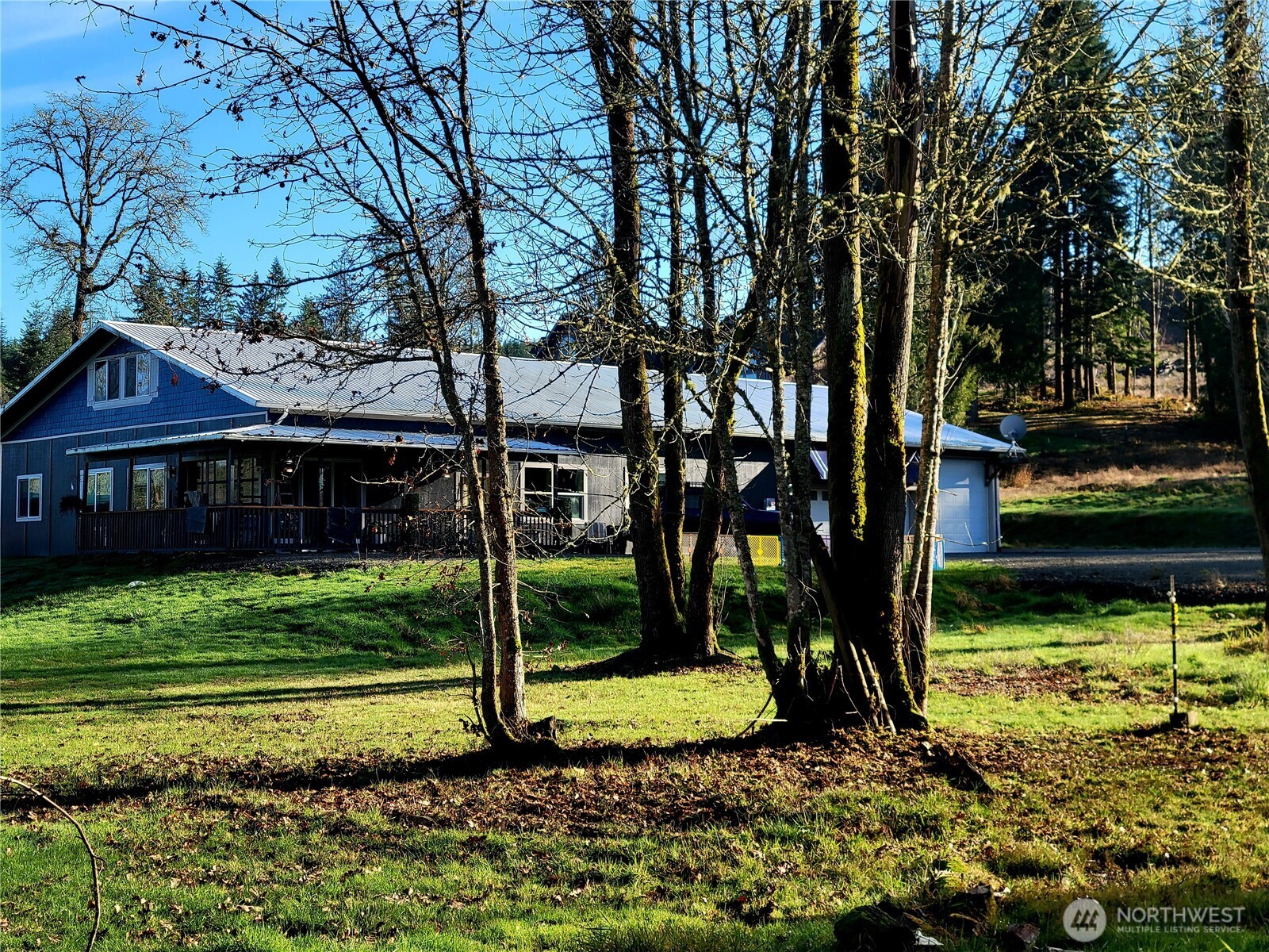 Unique & Amazing 4.85-Acre Property with Homesite, Shop & ADU – Just Minutes from I-5!  Over 6,000 SqFt of flexible living and work space, including a 1,384 sqft 1-bed/1-bath ADU—ideal for multigenerational living. Massive 3-bay shop plus a finished 1,638 SqFt bonus area ready for conversion to bedrooms, office, or gym. Main structure features 12’ ceilings, 2x6/2x10 framing, modern finishes, and a Large covered porch. Utilities are in place for a future custom home with territorial views. High-speed fiber internet from ToledoTel. Bordered by Timber land for added privacy. A rare opportunity to build, live, and grow—schedule your showing today!  This is truly a Must- See property!