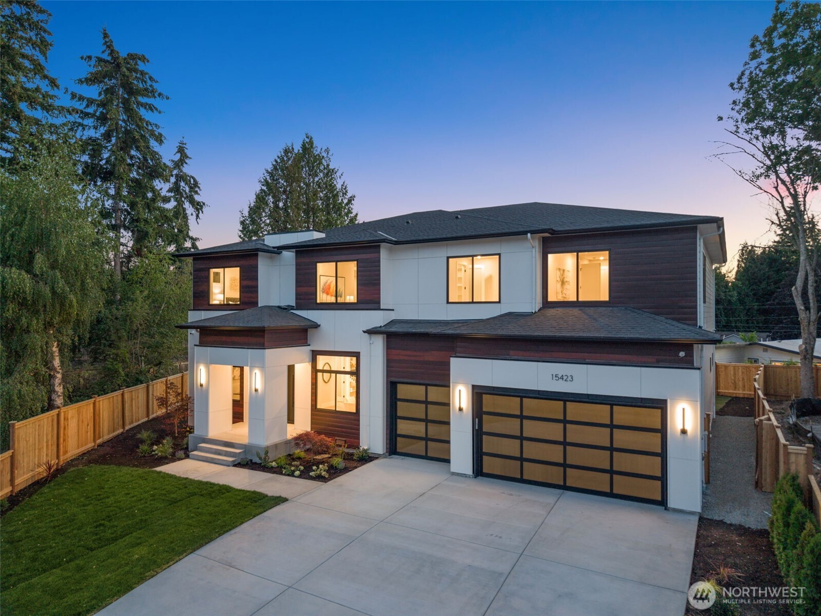 Experience luxury living in this newly completed home by Bellevue builder Brar Custom Homes. Expertly designed with premium finishes and thoughtful details, this stunning residence sits on a generous, peaceful lot in a cul-de-sac setting. Discover a thoughtfully laid-out open floor plan featuring a versatile main floor guest suite, gourmet chef's kitchen with premium appliances, and a dramatic two-story great room flooded with natural light. Entertain in style with sophisticated covered outdoor living featuring a gas fireplace, perfect for year-round enjoyment. Impressive architectural details showcase full custom wood cabinetry throughout, luxurious heated tile flooring, and designer fixtures. Energy-efficient solar panels reduce utility costs while supporting sustainability. The home's modern aesthetic seamlessly blends style, comfort, and environmental consciousness. The fully finished three-car garage features professional-grade epoxy flooring—ideal for showcasing vehicles or creating additional functional space. A large, well-designed driveway provides ample parking for guests and vehicles. Prime location offers convenient access to top-rated Bellevue schools, beautiful parks, premium shopping, and scenic trails. Exceptional quality craftsmanship and attention to detail are evident throughout every room. This is a rare opportunity to own a true luxury custom home in Bellevue.