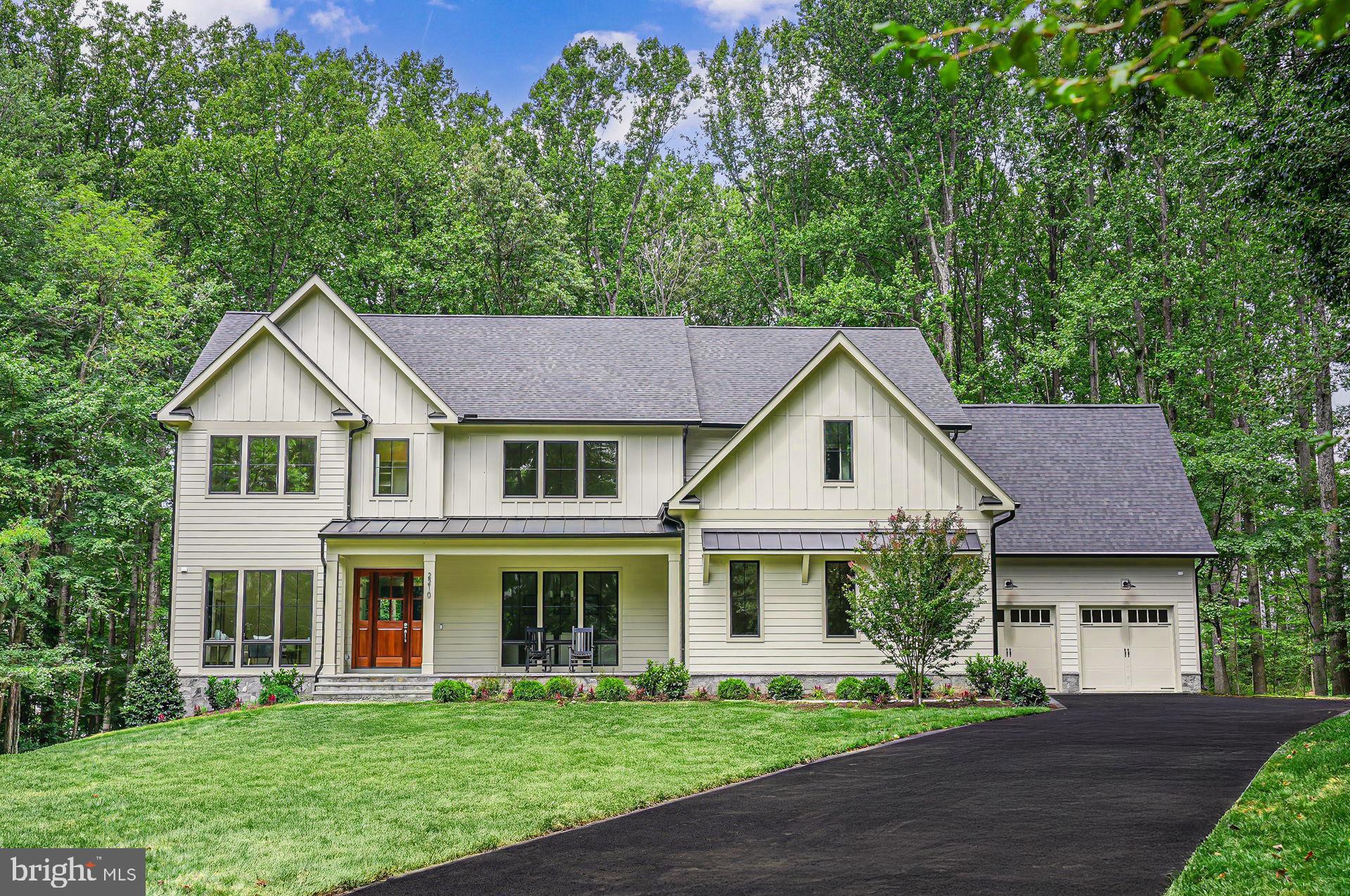 Builder Incentive will buy down rate as low as 3.75% for qualified buyers.  Rare opportunity to live on over two acres in one of Vienna's most sought after neighborhoods. Jefferson Homes presents a spectacular new home with gorgeous, private views. The elegant floor plan is ideal for entertaining. From the moment you enter, you are greeted by walls of windows, letting the outside in. The gourmet kitchen is a stunner featuring paneled appliances, column refrigerator and freezer, cabinet towers, quartz countertops, a sprawling center island and large breakfast room featuring floor to ceiling windows. The large family room with an oversized Anderson sliding door leads to a screened-in porch with gorgeous, stone-faced gas fireplace. There is a private study and large formal dining room with butler's pantry with beverage refrigerator.  The catering pantry is equipped with an additional dishwasher, sink and refrigerator. A main level bedroom suite is tucked away in the back of the home.  The large mudroom is outfitted with a custom dog wash, coat closet and built-ins. There are four garage spots with an electric vehicle charging station. The upper level features a primary suite with elegant sitting room showcasing the amazing view of the treetops. Spa like primary bath with heated floors and a soaking tub. There are four additional bedrooms, all with private baths. A stunning laundry room completes the upper level. The walk out lower level is filled with natural light. It features a rec room with gas fireplace, game room, exercise room with sauna, full wet bar with dishwasher and refrigerator, media room, bedroom and full bath. Huge unfinished storage area.   Madison high school pyramid. Close to all major commuting routes.