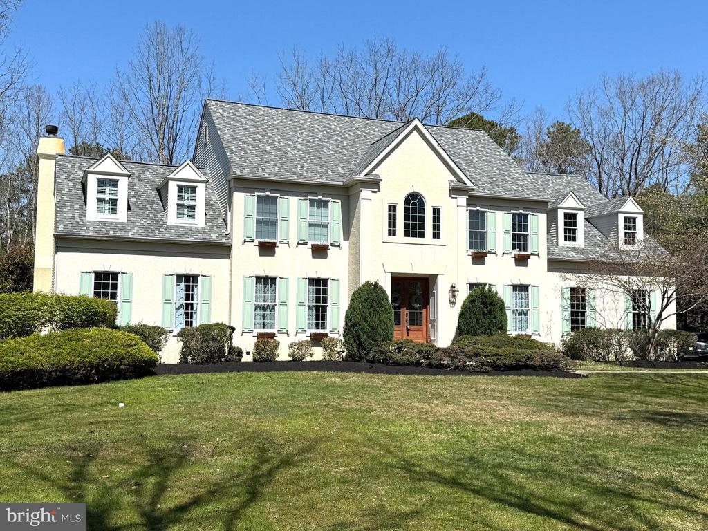 Your search is finally over! This IS THE ONE everyone has been waiting to go on the market.  This Stunning, Bob Meyer built “Ashbourne” model is located on a cul-de-sac backing to woods, showcasing three levels, with over 5500 sq. ft. of luxurious living and entertaining space. Completely renovated, this home offers 5 Bedrooms and 4.5 bathrooms.  Extensive owner upgrades make this home truly one of a kind.  Enter through the double front doors to a two-story foyer with a grand staircase with wrought iron balusters, gorgeous hardwood floors and sweeping views of the first floor.  Extensive millwork and designer light fixtures add a touch of elegance.  From the foyer you are greeted with open views of the beautifully appointed living room with glass French doors that lead to a First floor Library featuring custom built-ins. Pocket doors open to the Family room.  The formal dining room offers a tray ceiling and a custom light fixture.  The gourmet kitchen has been  renovated and features a Sub-Zero refrigerator, Bosch dishwasher, quartz countertops, subway tile back splash, large center island,Lurton smart lights and a Farmhouse sink overlooking the picturesque back yard.  A triple French door in the breakfast room opens to an expansive custom paver patio, perfect for outdoor entertaining.   The family room features a cathedral ceiling, recessed lighting, and a an impressive Floor to ceiling gas fireplace with a custom mantle accented with stone and shiplap. Completing the first floor is a large walk-in pantry with shelving, a beautiful powder room and a custom designed mud room with cubbies, abundant hanging space and sitting area creating organization and efficiency for this transitional area of the home.  The 2nd floor features a luxurious Master bedroom suite and bath with cathedral ceilings, a huge walk-in closet with lots of custom shelving, a large soaking jet tub, double sink vanity with Carrera marble, and stall shower.  There are 3 additional bedrooms with 2 of those having their own baths, custom closet systems, and a unique den/kid playroom with lots of shelving and cabinets.   The fully finished walkout lower-level features plenty of room to entertain including a Wet bar with cabinetry, quartz countertops and refrigerator, a guest bedroom, a storage area, a fitness/exercise room and a large family room with gas fireplace and shelving. There is also a full bath with quartz countertops. With its’ private walk-out, this space is perfect for an In-law suite, week-end guests or an au pair.  Additional amenities include a newer roof with Leaf Guard gutters, new HVAC on the 1st floor and a SONO sound system surround with in wall speakers.  This home sits on 1.12 acres, is beautifully landscaped and a private fenced in back yard. Truly the most private streets in Highbridge.  The front of the home faces open space, you are not looking at any homes and the back yard also backs to open space with wooded privacy also.