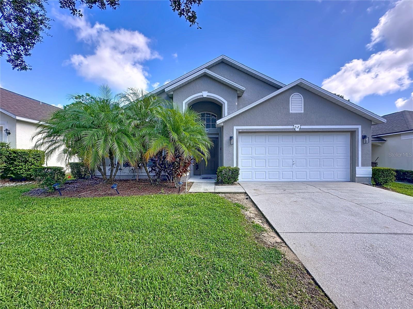 JUST PACK YOUR BAGS AND MOVE RIGHT IN! Welcome to this stunning 5 bed/ 3 bath pool home in the award-winning and desirable gated community of Southern Dunes Golf & Country Club. This home is being sold FULLY FURNISHED & TURN-KEY ready!  Overlooking the 17th FAIRWAY, this home boasts AMAZING backyard VIEWS of the GOLF COURSE and features mature landscaping. Step inside to find a bright and open floor plan featuring a formal dining room, spacious kitchen and living room combo accented by high ceilings and clear sightlines to the screened enclosed pool and lanai. The delightful open kitchen has plenty of cabinetry, stainless appliances, a large pantry, expansive island with built-in storage and ample space for hosting friends and family.  With a split bedroom floor plan, the primary suite offers an en-suite bathroom with dual vanities, soaking tub, walk-in shower, and two walk-in closets for your own personal retreat. The neutral flooring and warm color scheme carry throughout the home and lead us into the hall where you will find two generous sized bedrooms that share a full bathroom. At the end of the hallway there is a third bedroom with en-suite that could be considered a second primary bedroom. The fifth bedroom is located in the front of the home and could also serve as a great office or flex space. One of the main features of this home is the oversized screened in lanai with a covered seating area and greenery for privacy making a perfect area for year-round enjoyment. The home has a double car garage and driveway, offering plenty of off-street parking and storage. Many major upgrades have been completed, including ROOF (2021), HOT WATER HEATER (2024), POOL PUMP (2023) and INTERIOR PAINT (2025). This lovely residence is situated in the highly acclaimed championship Southern Dunes Golf Course and Country Club offering 24 hr. security, tennis courts, community pool, fitness center, clubhouse and more. It is a short drive to Orlando or Tampa attractions, airports, shopping, Legoland and to either the Gulf or Atlantic beaches. Whether you make this your primary residence, vacation home or short-term rental, EVERY DAY in this stylish home will make you feel like you are on a permanent vacation!  Be sure to SCHEDULE your showing TODAY!