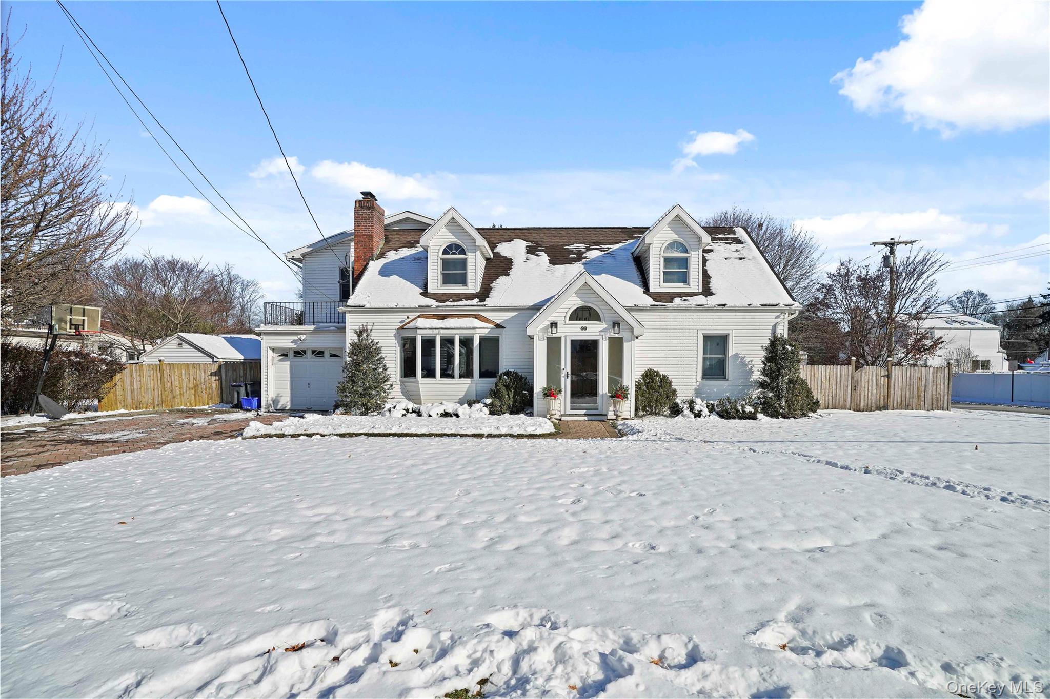 Nestled in the coveted Poet’s Corner neighborhood, this expanded Cape offers the perfect blend of classic charm and modern comfort. Featuring four spacious bedrooms and three full bathrooms, this turnkey home is designed for both everyday living and effortless entertaining.A beautifully manicured front lawn, inviting walkway, and paver driveway create exceptional curb appeal. Inside, gleaming hardwood floors and elegant board and batten molding enhance the first floor. The home offers a gracious formal living room with a fireplace, a formal dining room ideal for hosting, and a large family room that serves as the heart of the home. A full bathroom on the first floor adds everyday convenience.The gourmet chef’s kitchen is thoughtfully designed with ample space for cooking and gathering. Upstairs, the expansive primary suite is a true retreat, complete with an ensuite bathroom featuring a separate shower, soaking tub, and dedicated vanity area.Outside, enjoy a large, level backyard perfect for entertaining, play, or relaxation. Commuters will appreciate the nearby bus service to the railroad, making travel effortless, while access to Greenburgh Recreation is an added bonus. With its prime location, flexible layout, and move in ready condition, this home presents a rare opportunity in one of the area’s most desirable neighborhoods.