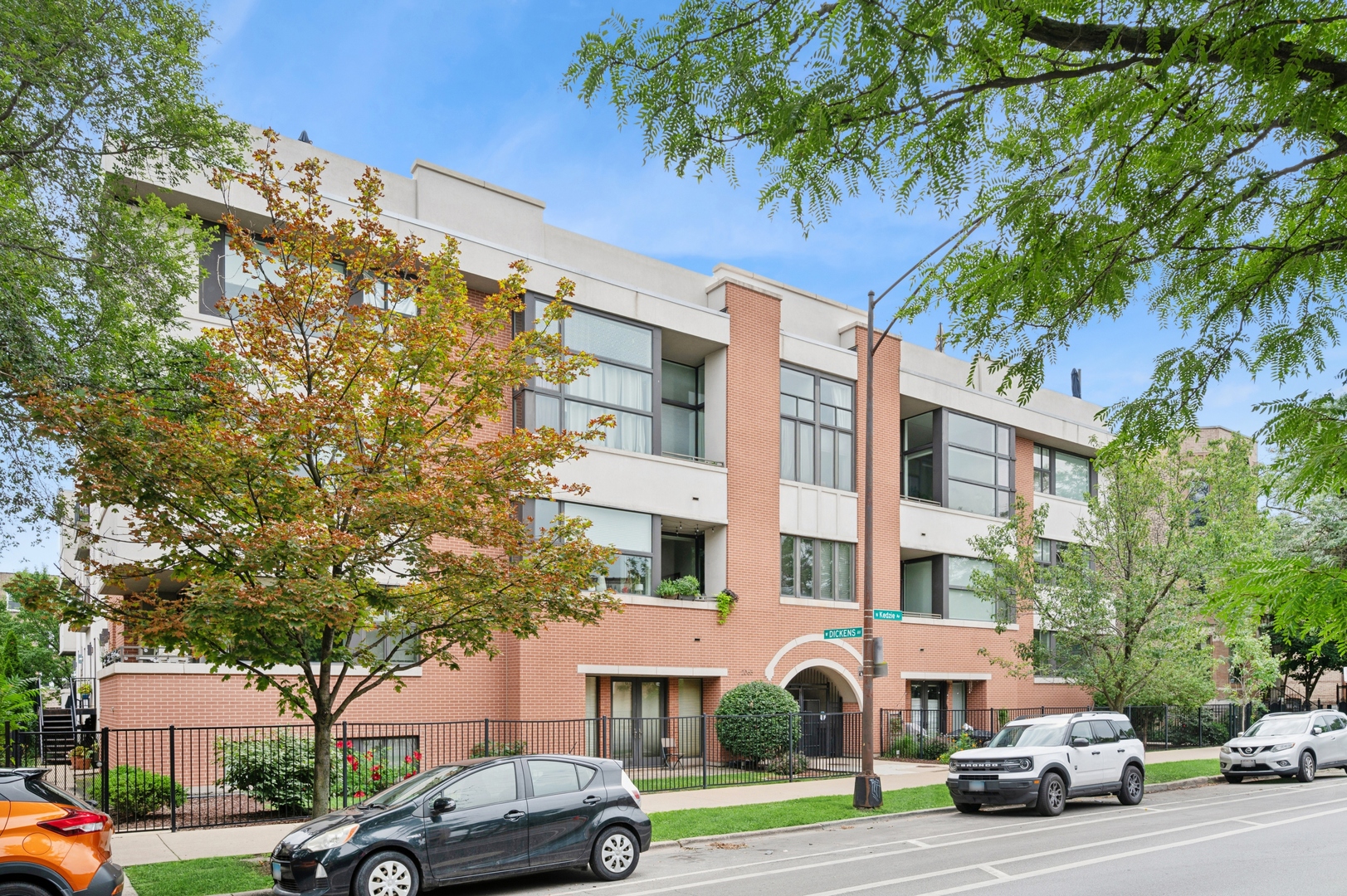 Welcome to this spectacular 3-bedroom, 2.5-bath condo right in the heart of Logan Square! This designer-inspired duplex is full of natural light and boasts a spacious main floor living space featuring an open kitchen, living room, space for a dining room table and a half bath. Plus, there's a balcony off the kitchen-ideal for grilling and enjoying sunny days. One of the bedrooms on the main level is a perfect candidate for a home office or true third bedroom.    Head to the lower level to find two more bedrooms, including a primary suite with an en-suite bathroom equipped with a seperate whirlpool tub and standalone shower, a professionally built out custom walk-in closet. The second bedroom also very spacious features a custom closet design.    Recent upgrades include sleek stainless-steel appliances from 2021, a tankless hot water heater installed in 2022, and a washer/dryer from 2021. The kitchen shines with a custom tile backsplash added in 2021. This well-kept building is just steps from Palmer Square, the blue line train, the 606, and all nightlife / fantastic restaurants on Armitage and in Logan Square. An outdoor gated parking space is included in the purchase price.