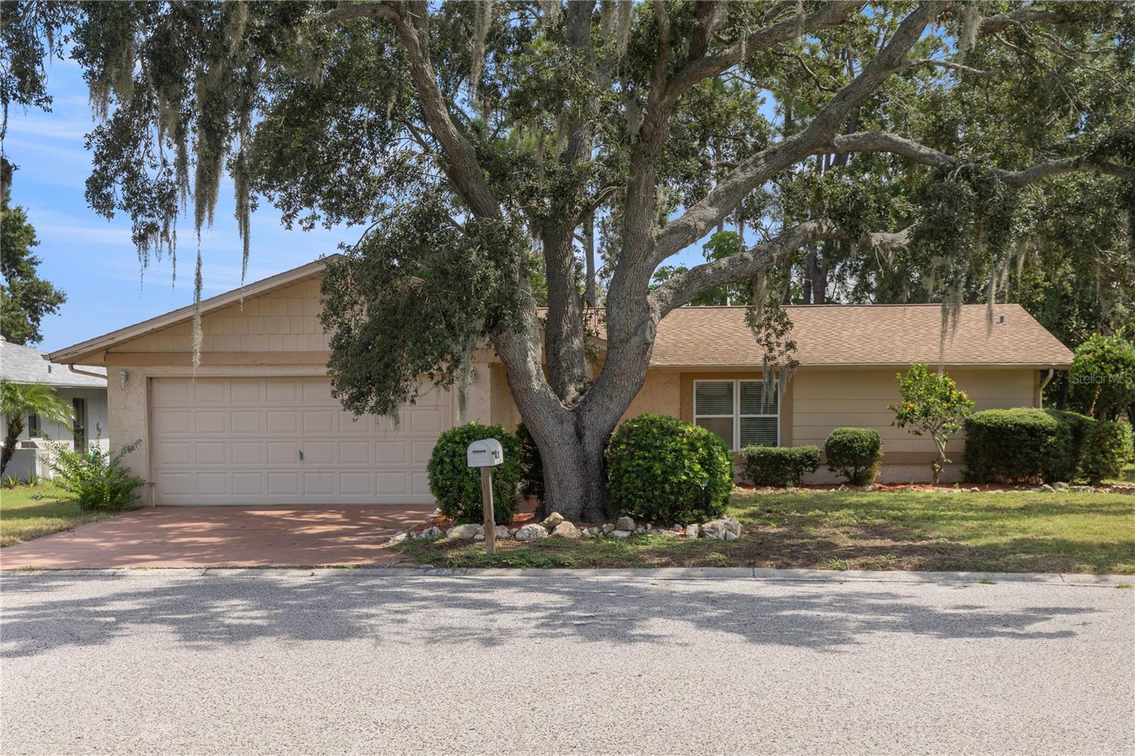 Welcome to this charming single-family home nestled in the sought-after Gulf Harbors Woodlands neighborhood of New Port Richey. This 1,584 sq ft residence boasts 3 bedrooms, 2 baths, and sits on a generous 7,840 sq ft lot. Built in 1980, the home offers classic Florida living with abundant potential. Bonus, Large enclosed lanai (over 600SF) With it's own A/C unit great for entertaining and family gatherings. The square footage is not included in the heated SF fo the house.  
Residents here enjoy exclusive community amenities, including a clubhouse, refreshing swimming pool, tennis courts, and 24/7 boat ramp access—Great for boating enthusiasts. The neighborhood is also celebrated for its private beach access and friendly, peaceful atmosphere. Where else can you go and have your own private beach
Conveniently located near schools (Richey Elementary, Gulf Middle, Gulf High), restaurants, shopping, and parks, this property offers a rare opportunity to blend coastal recreation with comfortable suburban living.