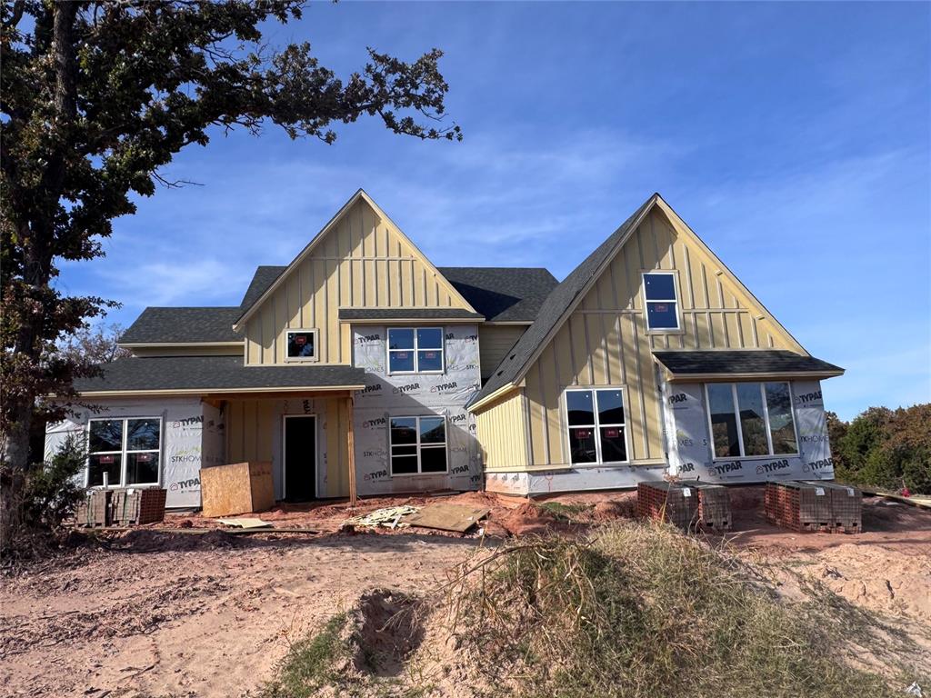 Welcome to the spacious and luxurious Scissortail floor plan, a stunning 3648-square-foot residence that seamlessly blends comfort and sophistication. Boasting 5 bedrooms, 3 bathrooms, a study, and a loft, this home is thoughtfully designed to meet the needs of a modern lifestyle. The 3-car split garage with a side load provides ample space for vehicles and storage. Upon entering, you are greeted by a grand foyer that leads to a captivating staircase, setting the tone for the home’s elegance. The primary bedroom suite features separate sinks and a standalone tub, creating a serene retreat. Three additional bedrooms and a well-appointed bathroom are conveniently located upstairs, ensuring privacy and space for everyone. The heart of the home lies in the expansive kitchen with a large square center island, perfect for both casual meals and entertaining guests. The open layout flows seamlessly into the living spaces and extends to a long covered back patio, inviting you to enjoy outdoor living in style. Practical elements such as a mud bench at the end of the hallway from the garage entry add functionality to the design, ensuring a seamless transition from the outside world to the comforts of home. With its thoughtful layout and upscale features, the Scissortail floor plan is the epitome of modern living.