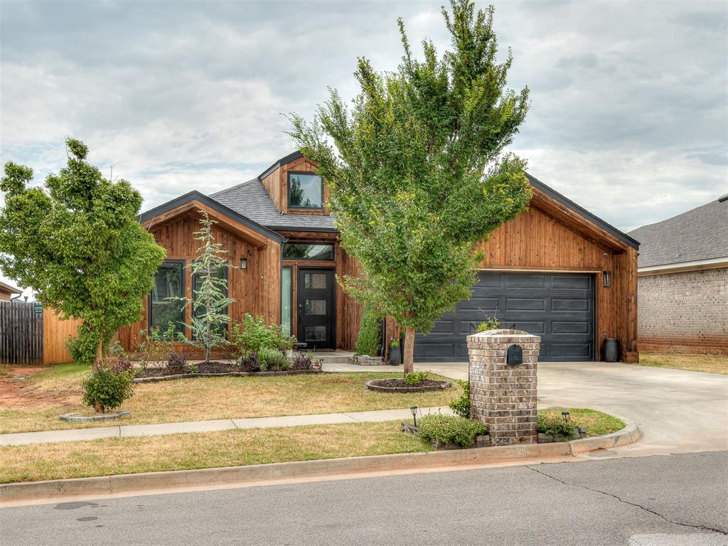 Welcome to this meticulously maintained, custom-built 3-bedroom, 2.5-bath home with a dedicated office, perfectly situated on a quiet cul-de-sac in a terrific Norman neighborhood.  The gorgeous cedar-stained wood creates a wow factor first impression, complemented by gorgeous landscaping and a covered front porch. Inside, you’ll find wood flooring throughout the main living areas, comfortable carpeted bedrooms, and thoughtful finishes throughout.  The chef’s dream kitchen is truly the heart of the home, featuring a large island, stylish backsplash, a Thor gas range/oven, and a huge pantry with plenty of storage. The open and functional design makes entertaining and everyday living a pleasure.  The spacious primary suite offers plenty of room, along with a beautiful primary bathroom and a large walk-in closet. The split-bedroom floor plan provides privacy, with the additional two bedrooms located on the opposite side of the home. Both bedrooms feature large closets and share a spacious L-shaped Jack-and-Jill bathroom.  Step outside to enjoy the large backyard and extended covered porch, complete with an outdoor kitchen island—perfect for entertaining or enjoying quiet evenings outdoors. A brand-new wood privacy fence was installed in July 2026.  Storage is abundant throughout the home, and every detail reflects the care and pride of ownership that has gone into maintaining this property.  The neighborhood offers an incredible collection of family-friendly outdoor amenities, including walking trails, greenbelts, catch-and-release fishing ponds, playgrounds, a splash pad, basketball court, and soccer field.  With a fantastic location in Norman, you’ll be conveniently close to shopping, restaurants, and everyday conveniences while still enjoying the peaceful setting of a quiet cul-de-sac.  A beautifully maintained custom home with exceptional indoor and outdoor living spaces—this one truly has it all!