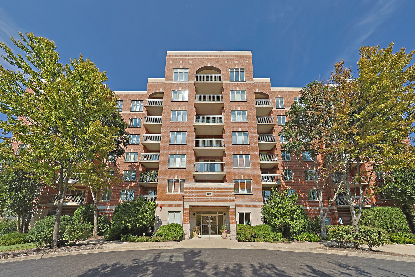 Top-floor penthouse living at its finest! This bright, recently updated residence boasts sweeping southern views from an expansive private balcony right off your living space. The interior features fresh paint, pristine hardwood floors throughout, and a sunlit kitchen equipped with a skylight, all newer appliances, rich cherry-finish cabinetry, and recessed lighting. Enjoy optimal privacy with a desired split-bedroom layout. The luxurious primary suite includes a massive walk-in closet and a spa-inspired bath with a soaking tub and separate shower. Rare benefit: Includes two tandem indoor parking spaces (#56 & #57) and 2 huge private dedicated storage room!