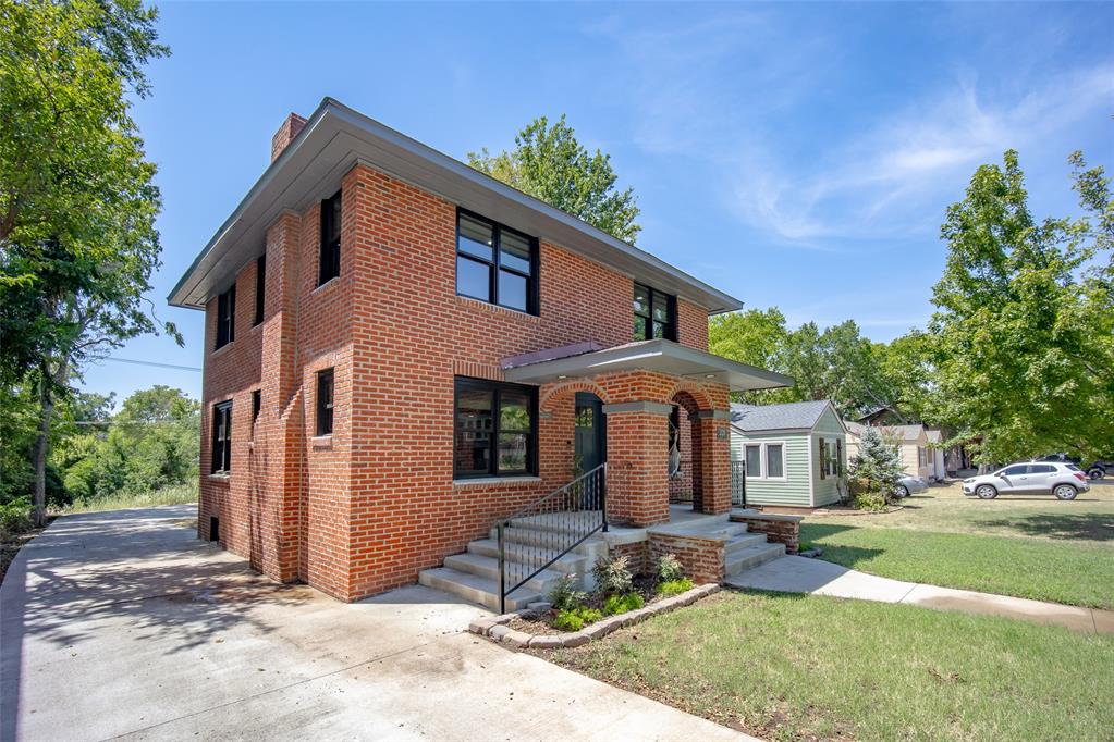 A Century of Character reimagined for modern living.Welcome to this thoughtfully renovated 4-bedroom, 3-bathroom, 2-story bungalow in Norman’s coveted Southridge Historic District neighborhood. Built in 1924, this 1,776 square foot home blends timeless architecture with today’s comforts in one of Norman's most desirable locations.Enjoy the best of OU campus living, just steps from The Mont, Campus Corner, and the iconic Palace on the Prairie. Whether you’re walking to dinner, attending a Sooner game, or enjoying the charm of one of Norman’s premier historic neighborhoods, this location is hard to match.Inside, the completely remodeled kitchen is the heart of the home,  fresh interior paint, and original hardwood floors that preserve the home’s historic character. Behind the scenes, nearly every major system has been updated, including all new electrical service and wiring, completely new plumbing from the city main, two high-efficiency HVAC systems with new ductwork, heat pumps with natural gas backup heat, tankless water heater, and closed-cell spray foam insulation throughout the home and attic for exceptional comfort and efficiency. The 360 square foot partial basement offers a dedicated laundry room, generous storage, and the security of a safe shelter during storm season. Exterior improvements include the home's professionally repointed brick, wood windows, newer roof, Trex deck, fresh exterior paint, newer concrete driveway and poured front steps. It even has a detached two-car garage with additional workshop space. If you’re looking for historic charm without sacrificing modern reliability, 1320 Classen Blvd. offers an exceptional opportunity in one of Norman’s most sought-after neighborhoods.