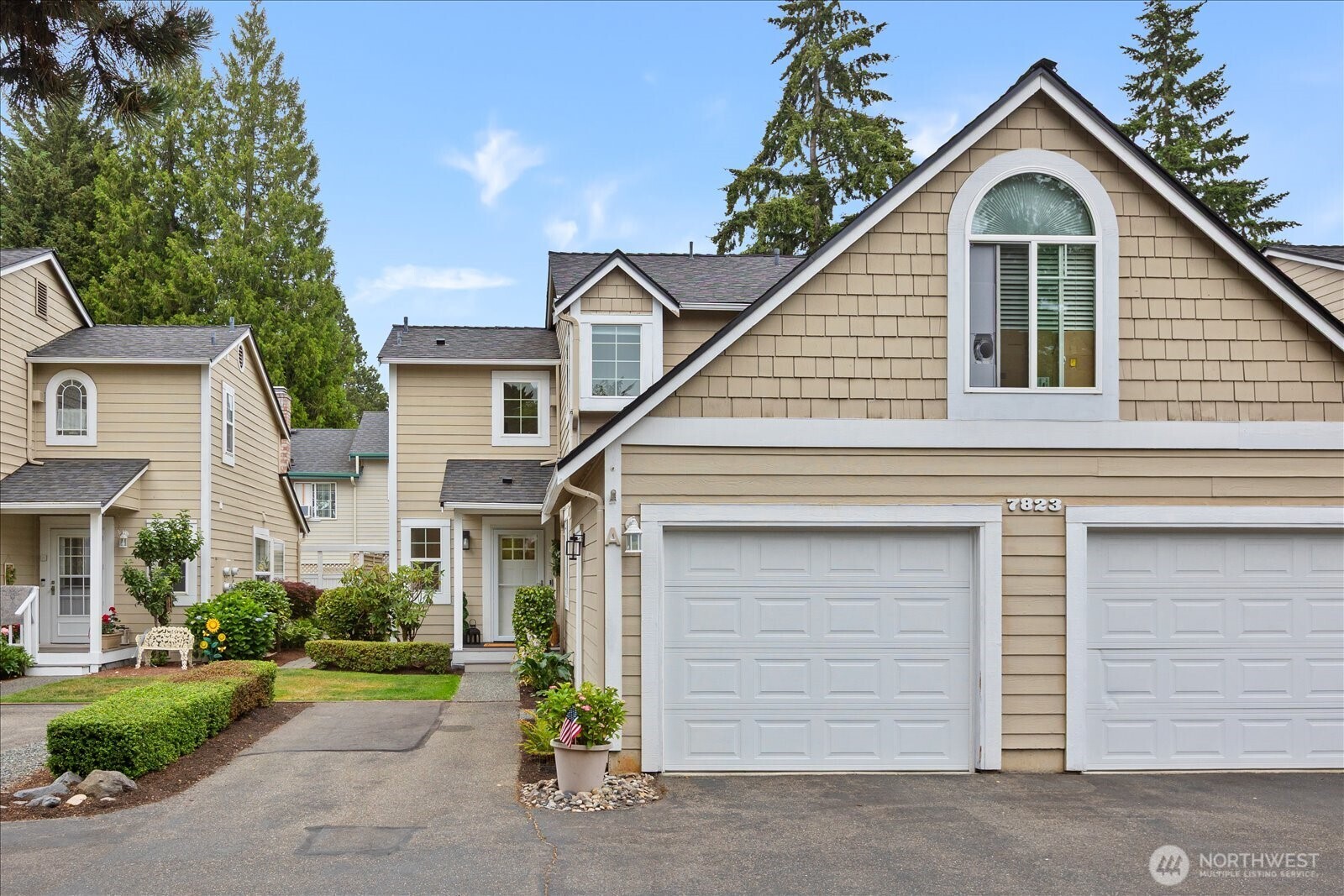 Modern Craftsman townhome in a prime location just minutes from downtown Edmonds. Tucked back from the street for added privacy, this move-in-ready home offers a spacious, light-filled floor plan with vaulted ceilings, generous storage, and thoughtful updates throughout. The inviting living room features a new electric fireplace and flows seamlessly to a private, fully fenced backyard perfect for summer BBQs and relaxing outdoors. The updated kitchen is complemented by fresh interior paint throughout, new lighting & fans, newer Fridge/Dishwasher/W/D. The flexible layout includes two bedrooms upstairs, including the primary suite, with a third bedroom & bathroom on the main level that’s ideal for guests, a home office, or multi-generational living. Enjoy the convenience of an attached garage, dedicated driveway parking and plenty of guest parking nearby. The well-managed HOA takes care of exterior maintenance and routine landscaping, making homeownership easy and low maintenance. Exceptional location, comfortable living, and everyday convenience, all wrapped into one beautiful home.