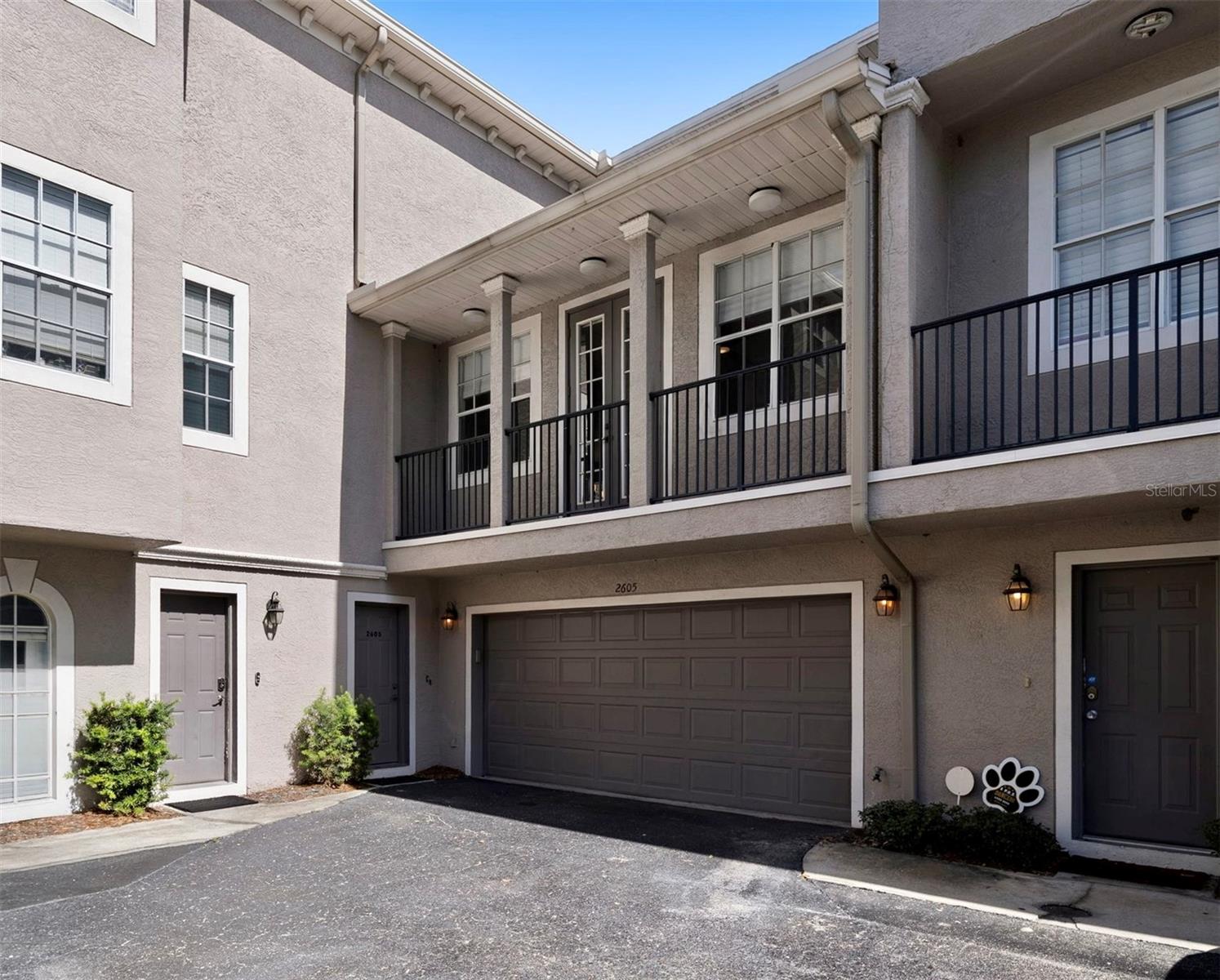 Where space, style, and location come together—this exceptional three-story townhome offers 2,700+ square feet of versatile living just steps from the best of Hyde Park, SoHo, and Bayshore. Offering four bedrooms and a unique and versatile floor plan, this home is ideal for families, multigenerational living, or anyone looking for space to live, work, and entertain. The main living level is located on the second floor and features an open, inviting layout with beautiful acacia wood flooring, a spacious kitchen, dry bar, and generous living and dining areas designed for effortless entertaining. The primary suite is also located on this level, creating a convenient retreat just steps from the heart of the home. The first floor offers exceptional flexibility with a private bedroom and full bathroom, along with an additional family room—perfect for guests, a home office, playroom, or multigenerational living. Upstairs, the third-floor features two additional bedrooms, each with its own full bathroom, providing privacy and comfort for family members or guests. Step outside your door and enjoy everything that makes South Tampa such a sought-after lifestyle—from morning walks along Bayshore to dinner and shopping at Hyde Park Village and the vibrant energy of SoHo. Some photos have been virtually staged for inspiration.
