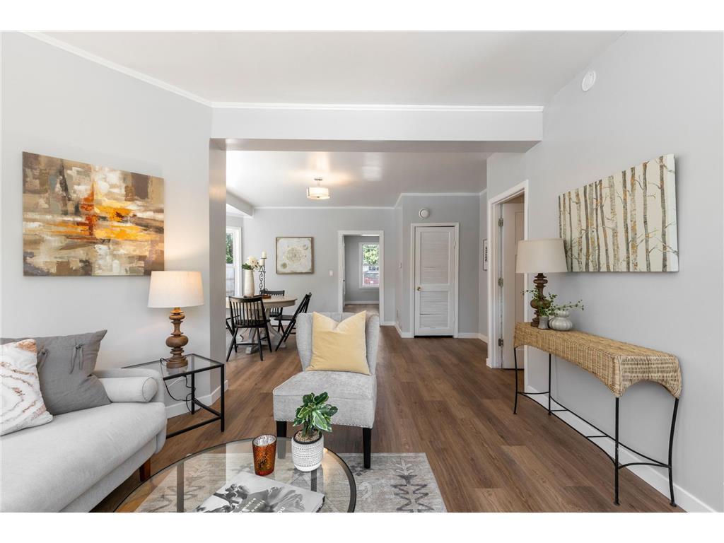 Beautifully renovated 3-bedroom, 2-bath home is move-in ready with modern updates throughout. Enjoy a spacious living room, a stylish and functional kitchen, and ample parking for up to 12 vehicles. Recent upgrades include new flooring, interior paint, cabinets, countertops, appliances, lighting, a new roof (2023), and more. A fresh concrete sidewalk adds the perfect finishing touch.