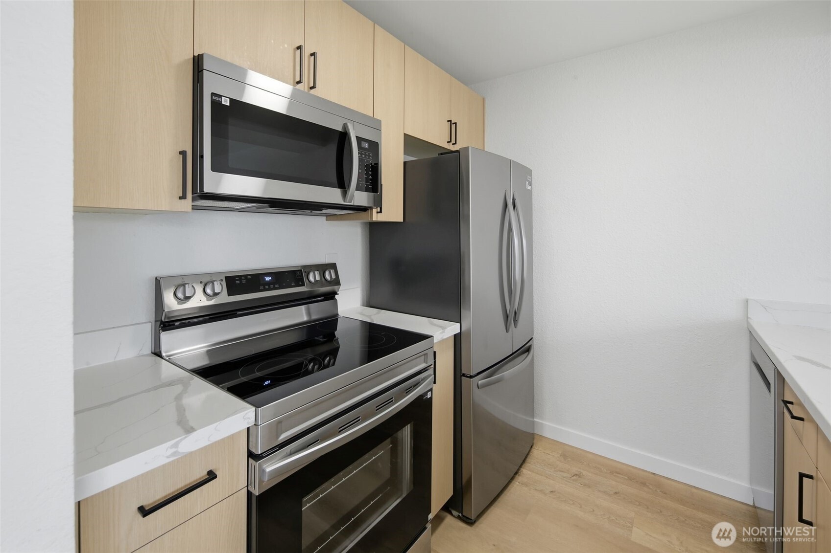 Beautifully remodeled and move-in ready condo in the desirable Renton Highlands! This bright and inviting home features stylish updates throughout, including new LVP flooring, fresh interior paint, sleek cabinetry, quartz countertop, new appliances, new water heater, and a modern upgraded bathroom. The functional layout offers comfortable living spaces filled with natural light. Enjoy two private balconies, plenty of storage, and two assigned parking spaces. HOA dues cover water, sewer, and garbage, and no rental cap provides excellent flexibility for both homeowners and investors. Conveniently located near shopping, dining, parks, and major commuter routes, making daily living and commuting easy. A perfect blend of comfort, style, and convenience—don’t miss this turnkey opportunity!