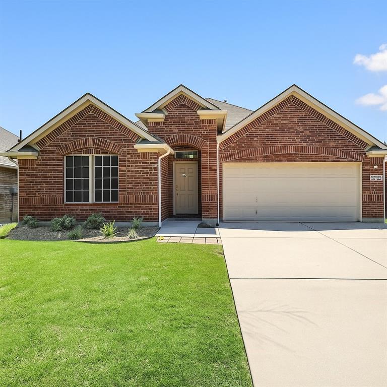 Charming and move-in ready! This home is in the sought-after Country Lakes community in Argyle. This beautifully maintained single-story home offers 3 bedrooms, 2 bathrooms, and a flexible open floor plan ideal for both daily living and entertaining.
The spacious kitchen features ample cabinetry and an island overlooking the bright living area with a cozy fireplace. The private primary suite features dual sinks, a soaking tub, separate shower, and a generous walk-in closet. Two additional bedrooms provide space for guests, family, or a secondary home office. Enjoy your morning coffee or evening gatherings on the back patio with a fully fenced backyard perfect for outdoor living. Country Lakes residents enjoy access to community pools, walking trails, and parks. This home combines comfort, style, and convenience with schools, dining, shopping and major highways just minutes away.